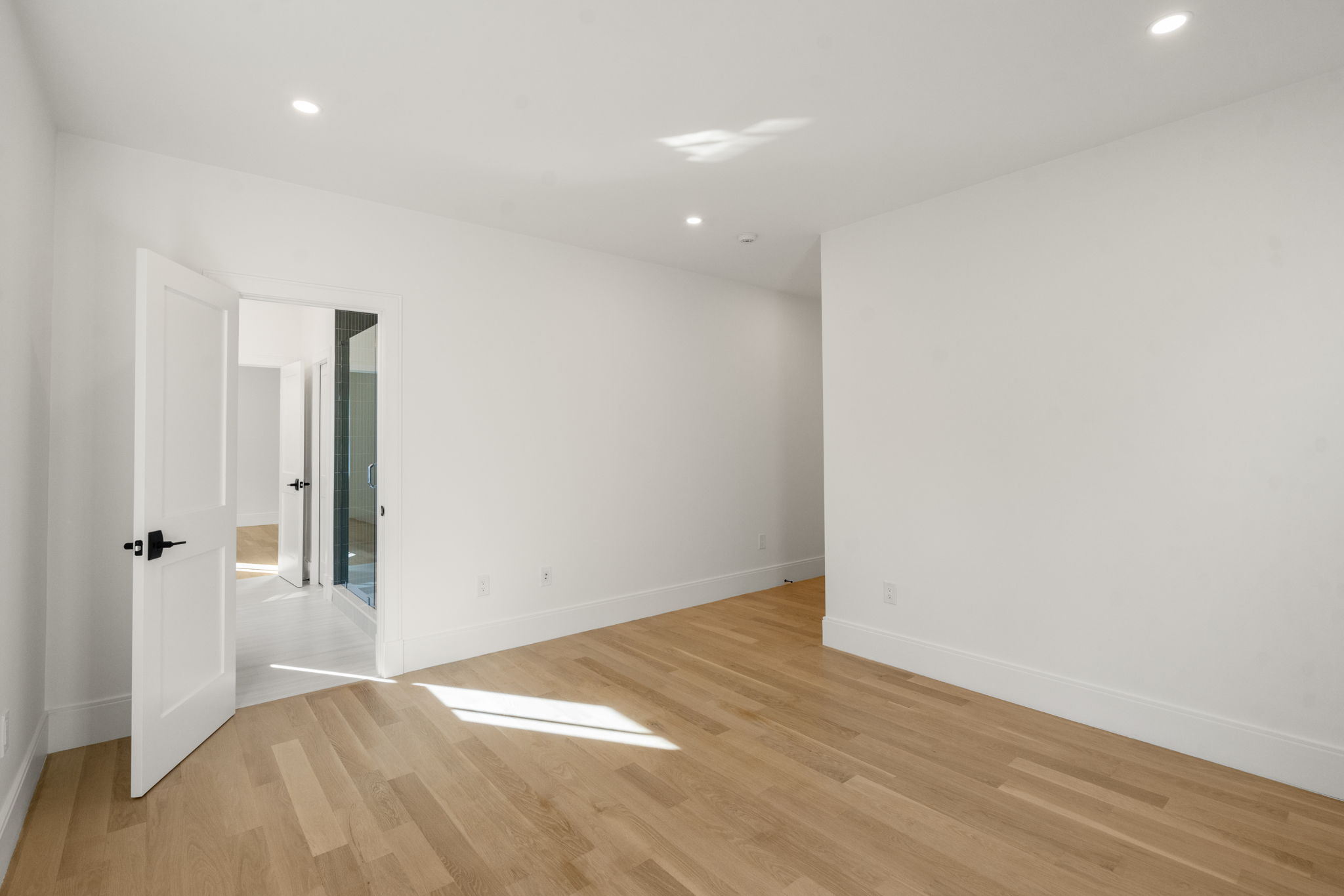 20 Oakland Street Wellesley, MA 02481 - Photo 20 of 30 a view of hallway with wooden floor