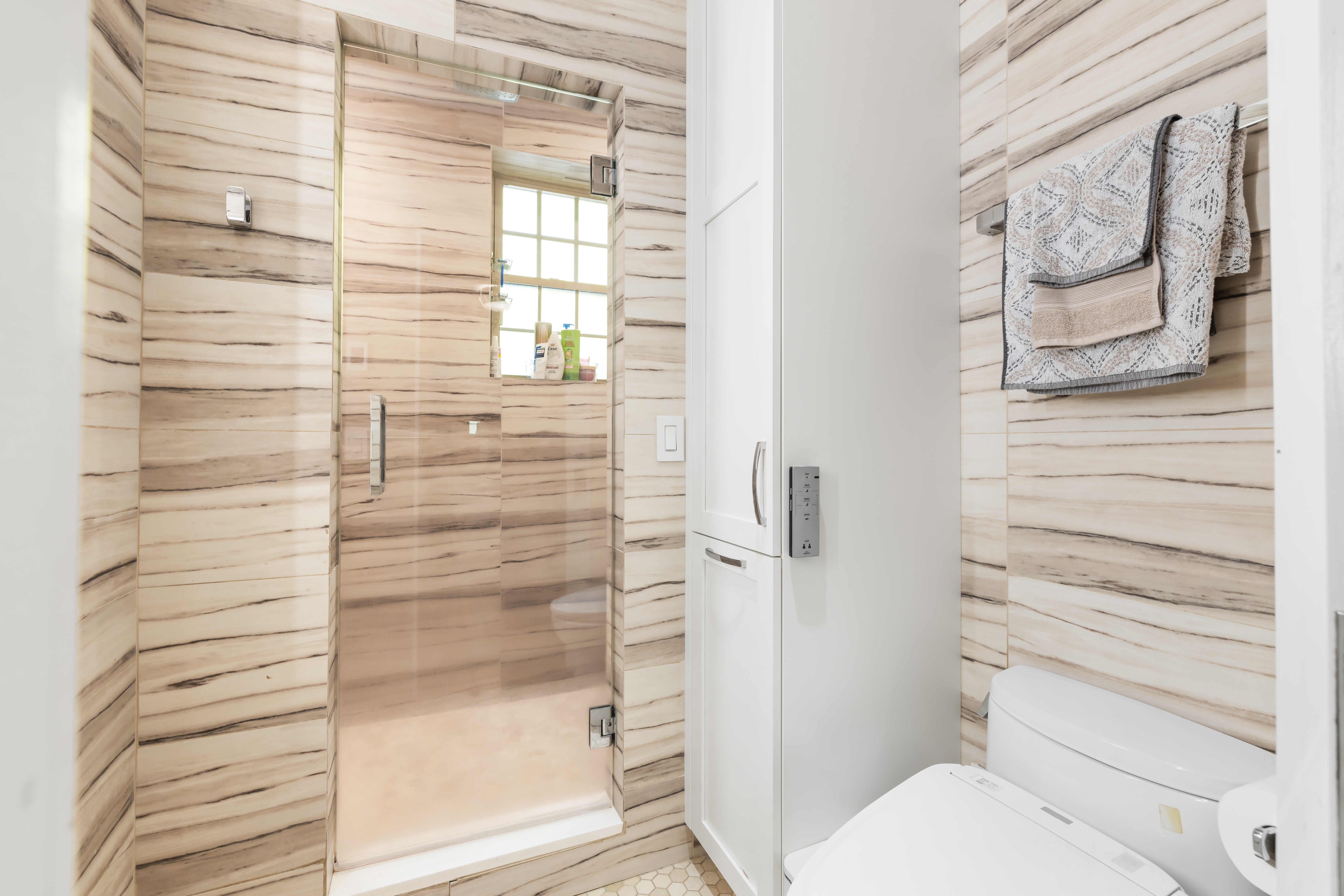 1490 Beacon Street, Unit 4 Brookline, MA 02446 - Photo 15 of 20 a bathroom with a toilet and a shower