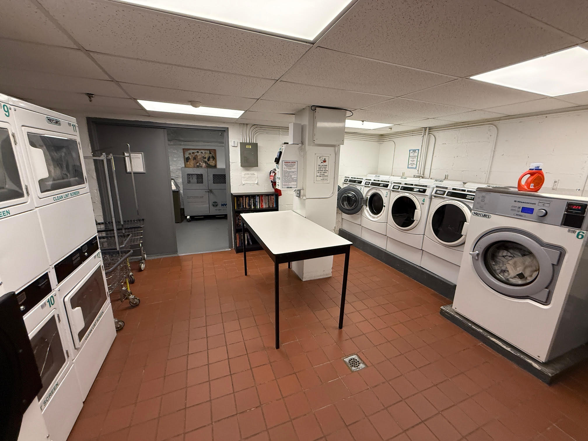 370 Central Park West, Unit 413 Manhattan, NY 10025 - Photo 15 of 19 a utility room with dryer and washer