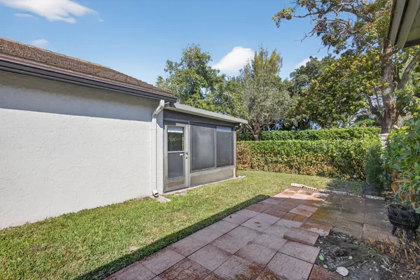 a view of a backyard with plants