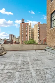 a view of city with tall buildings