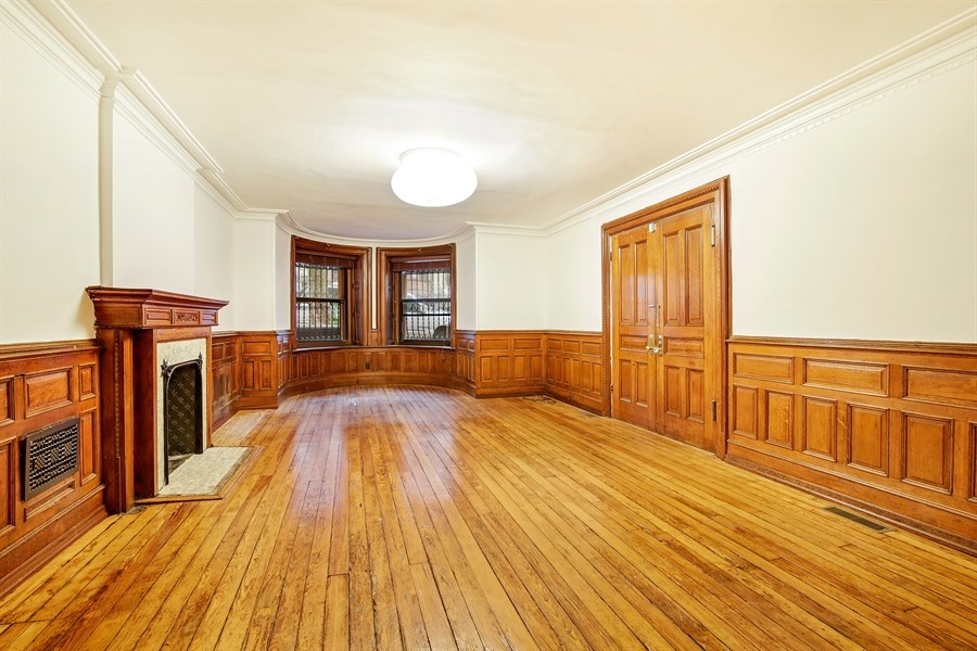 553 2nd Street, Unit 1 Brooklyn, NY 11215 - Photo 2 of 11 a spacious bedroom with a bed and wooden floors