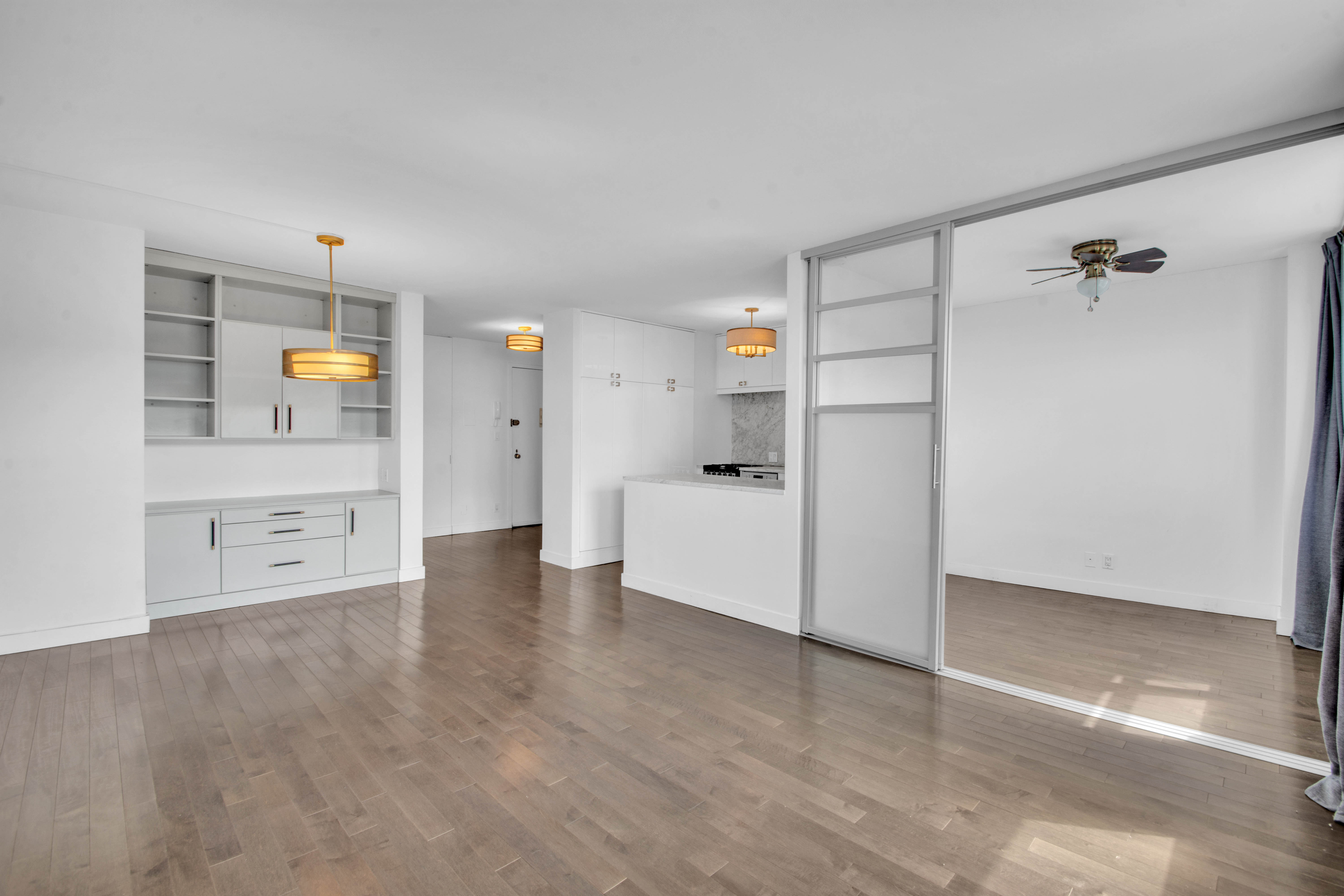75 Henry Street, Unit 29J Brooklyn, NY 11201 - Photo 3 of 16 wooden floor in an empty room