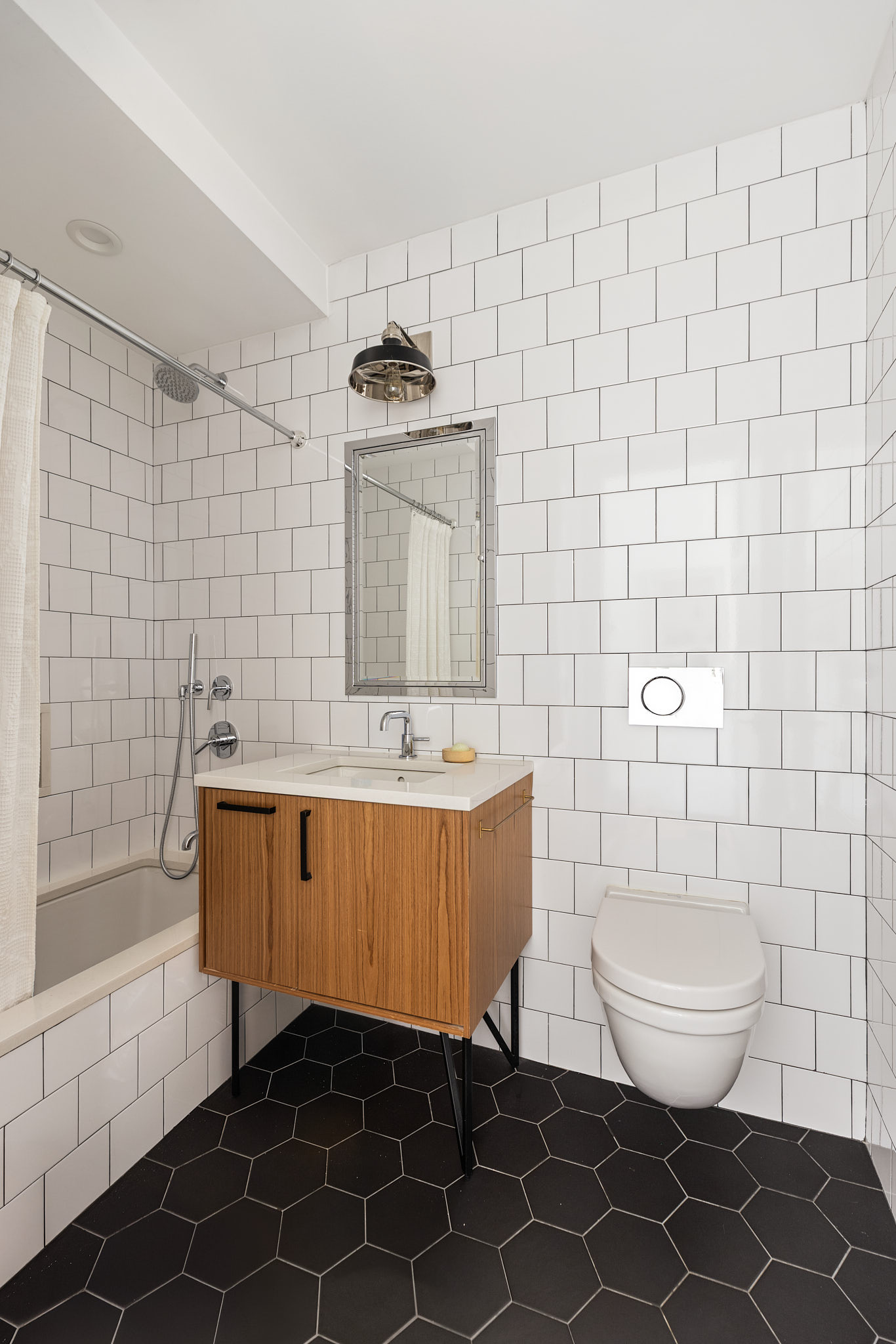 139 Sackett Street, Unit 2 Brooklyn, NY 11231 - Photo 8 of 10 a bathroom with a sink a toilet and shower