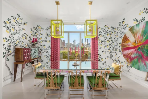 a front view of a dining room with furniture window and outdoor view
