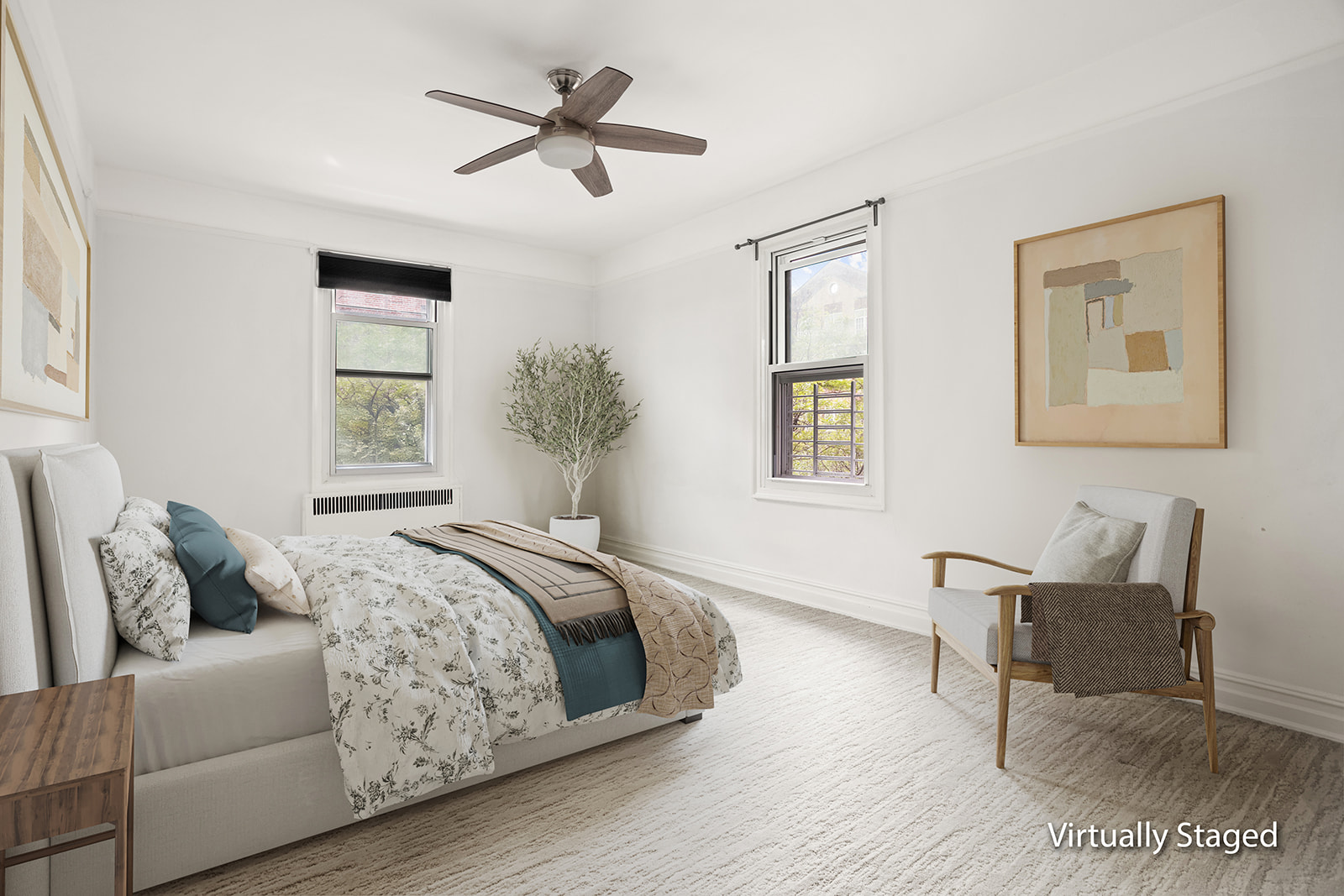 72-17 34th Avenue, Unit 4J Queens, NY 11372 - Photo 8 of 14 a bedroom with a bed furniture and a window