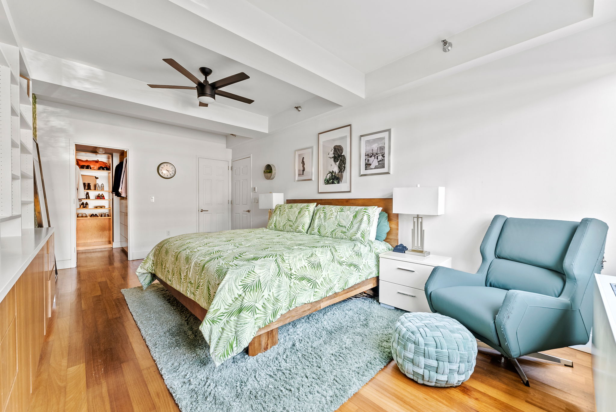 106 West 116th Street, Unit 2A Manhattan, NY 10026 - Photo 7 of 16 a bedroom with a bed and wooden floor