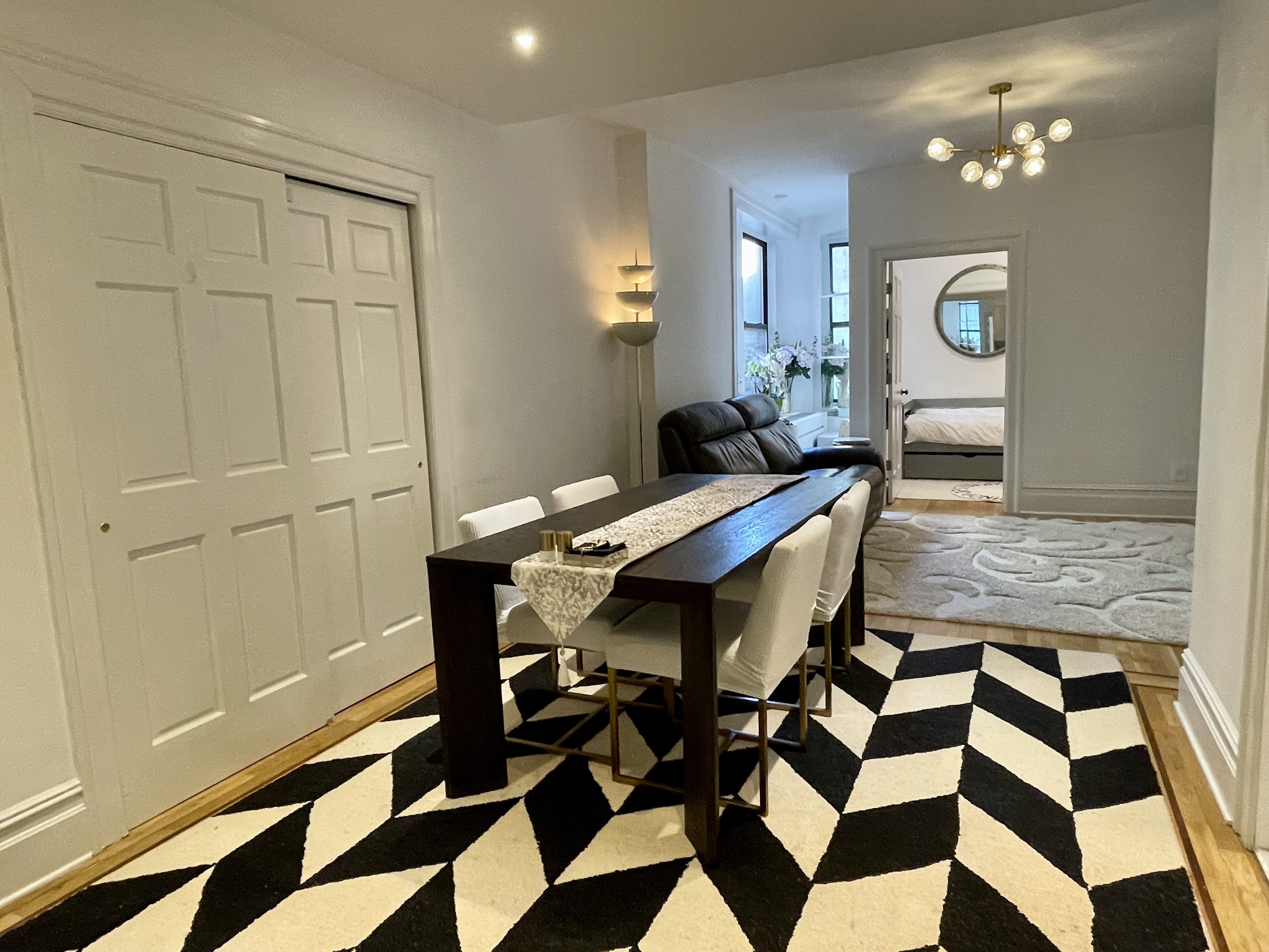203 West 90th Street, Unit 6B Manhattan, NY 10024 - Photo 7 of 22 a view of a dining room with a table and chairs
