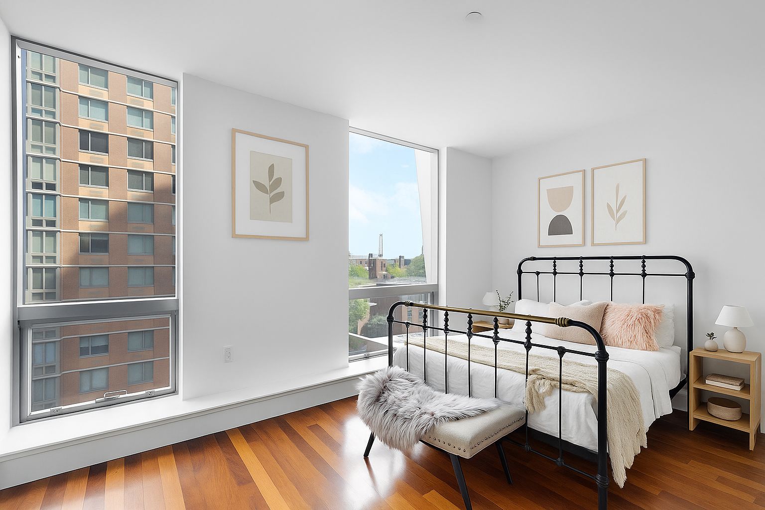 150 Myrtle Avenue, Unit 602 Brooklyn, NY 11201 - Photo 2 of 29 a view of a bedroom with furniture and wooden floor