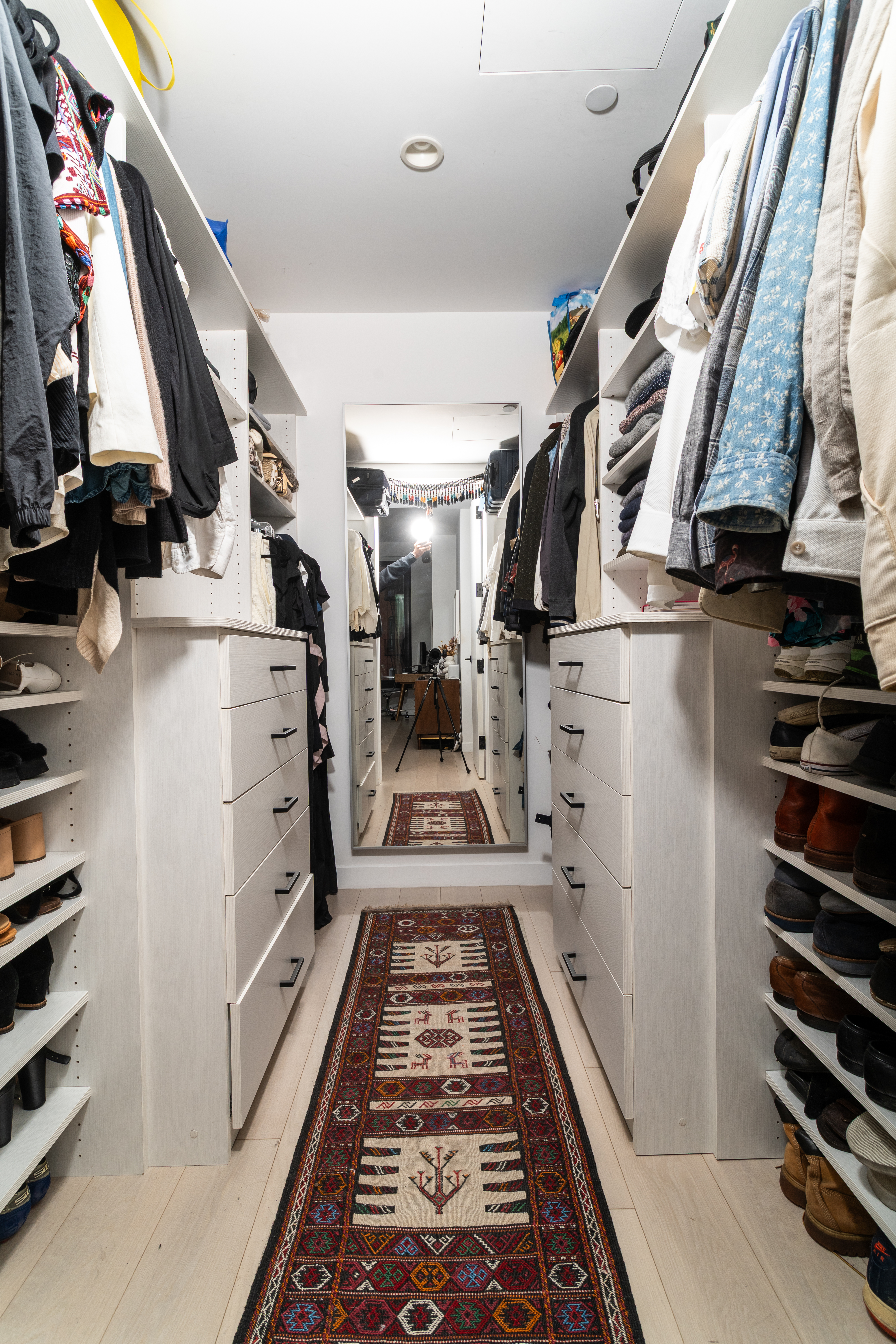 856 Washington Avenue, Unit 5A Brooklyn, NY 11238 - Photo 11 of 19 a view of walk in closet with clothes and shoes
