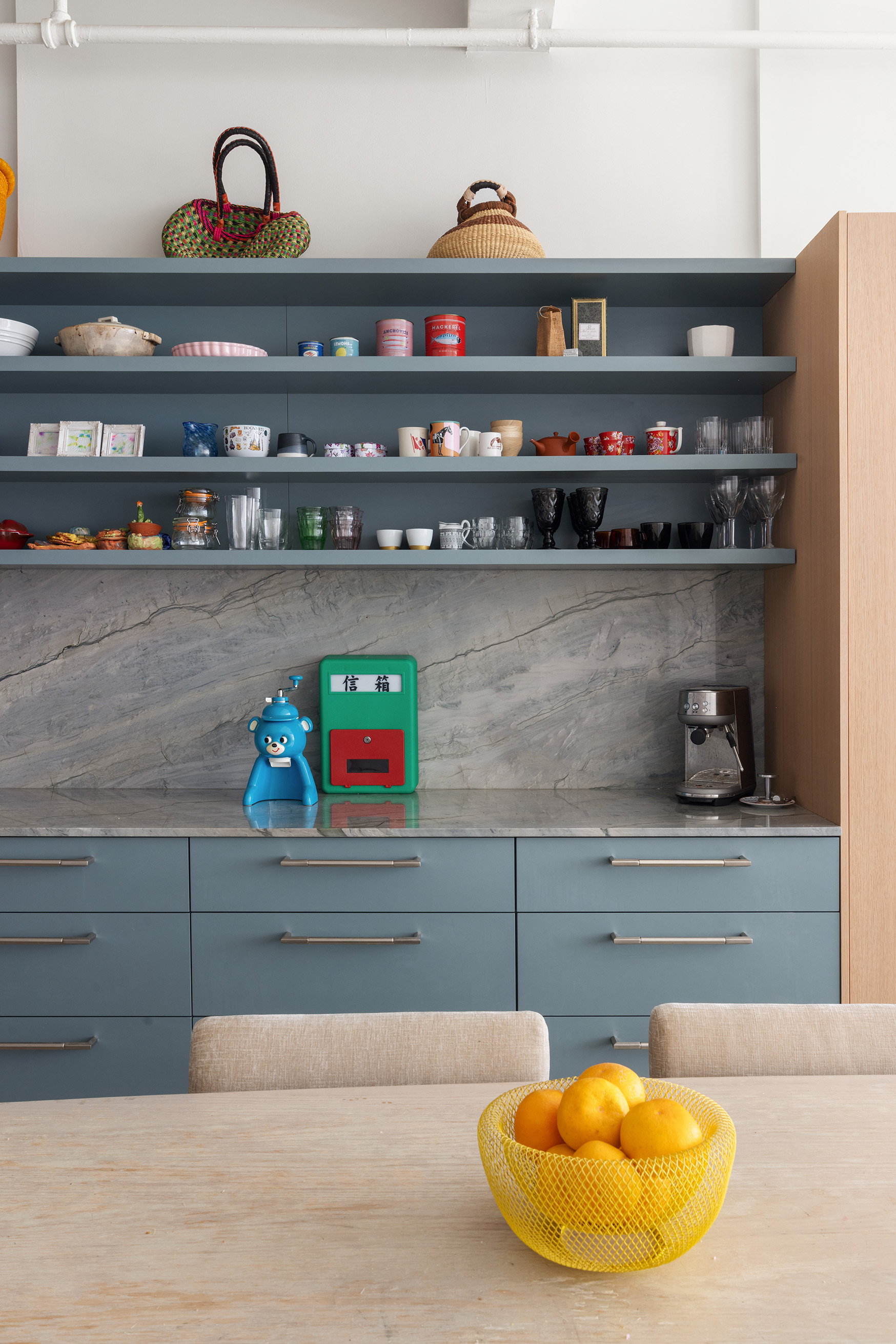 28 West 38th Street, Unit 6E Manhattan, NY 10018 - Photo 5 of 15 a kitchen with a stove and a shelf