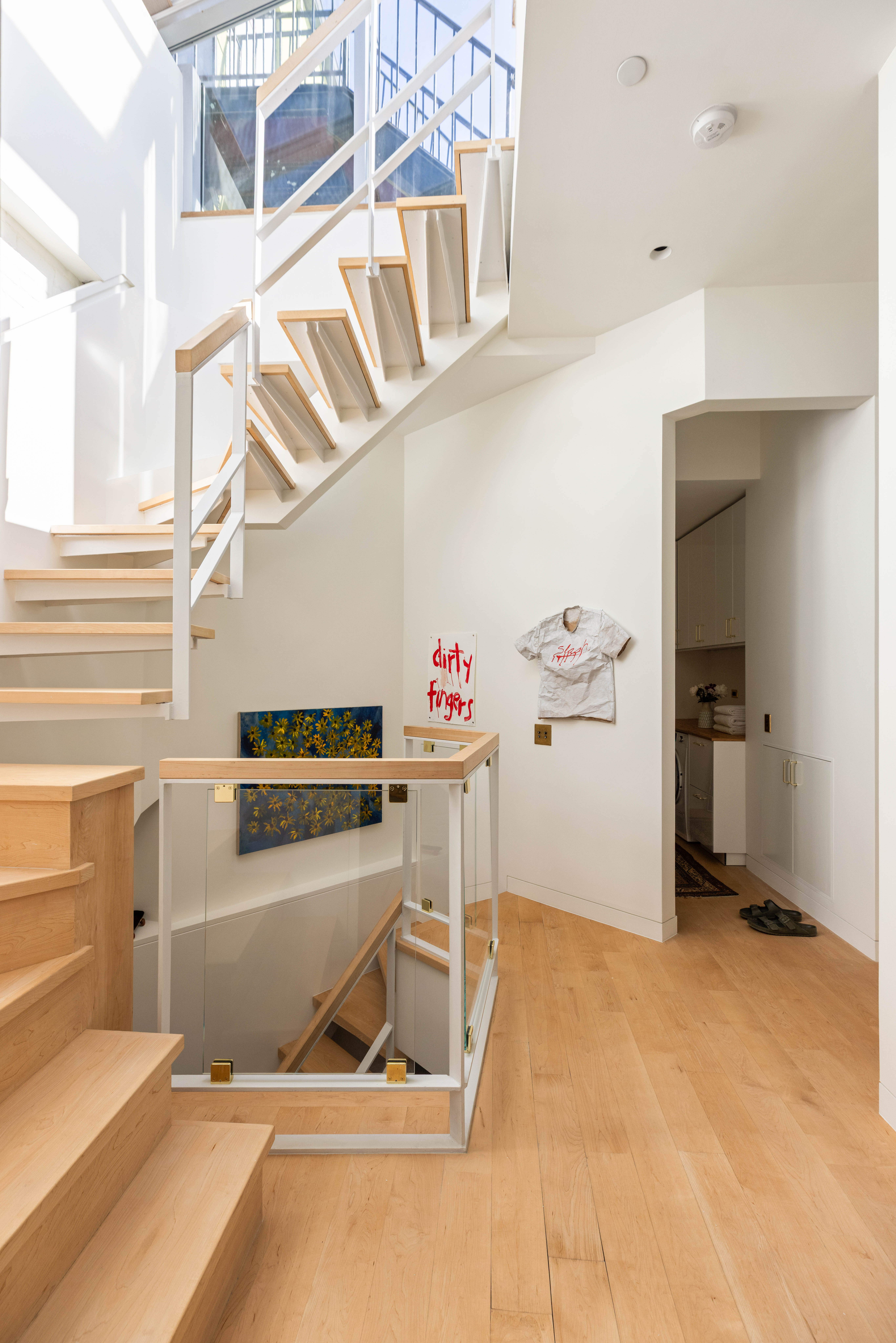 130 Jane Street, Unit 5/6F Manhattan, NY 10014 - Photo 13 of 23 a view of a kitchen with fridge and workspace