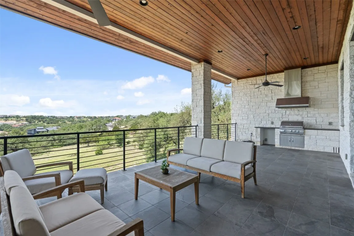 a outdoor living space with furniture and garden view