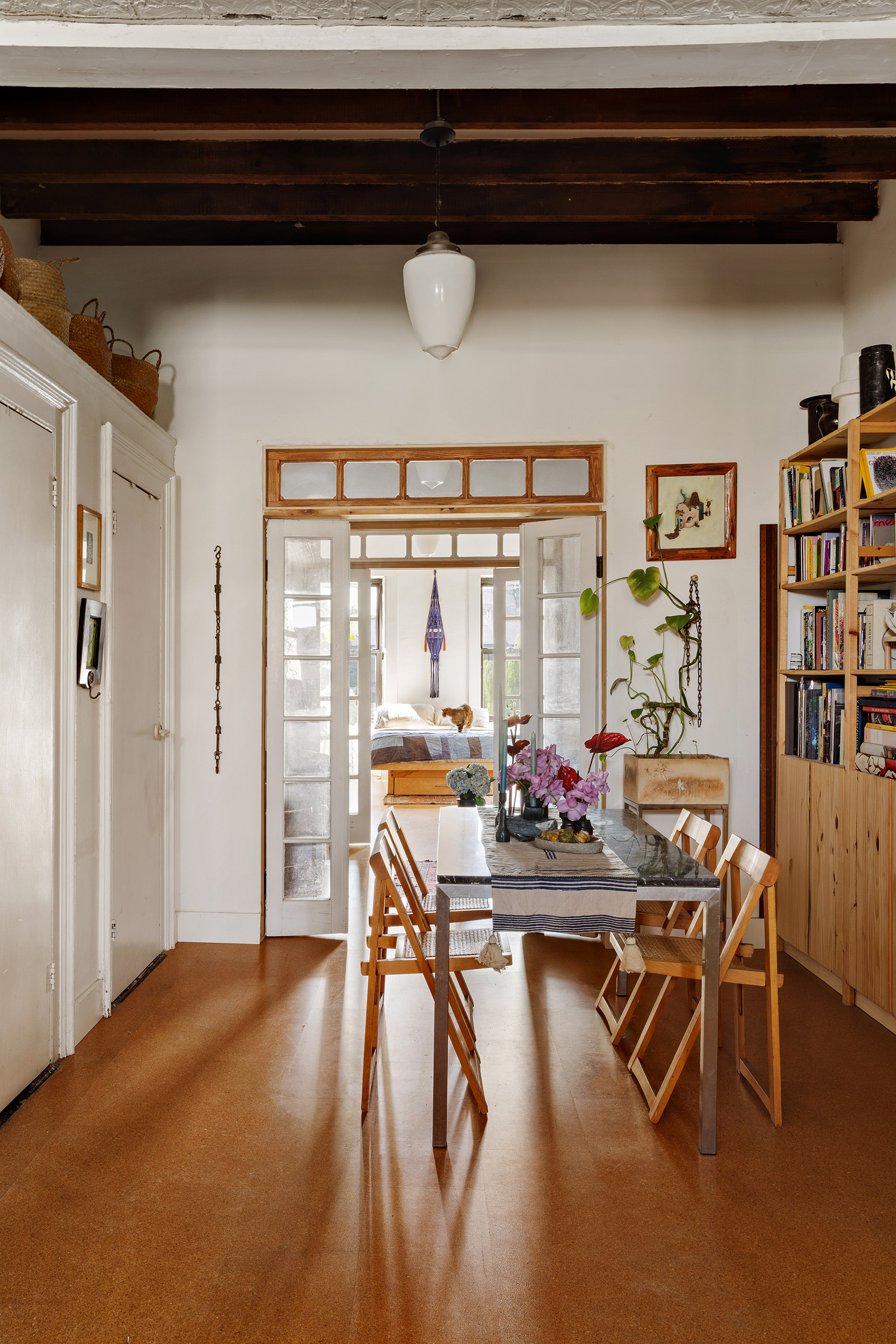 151 Grand Street, Unit 8 Brooklyn, NY 11249 - Photo 6 of 20 a view of a dining room with furniture and a chandelier