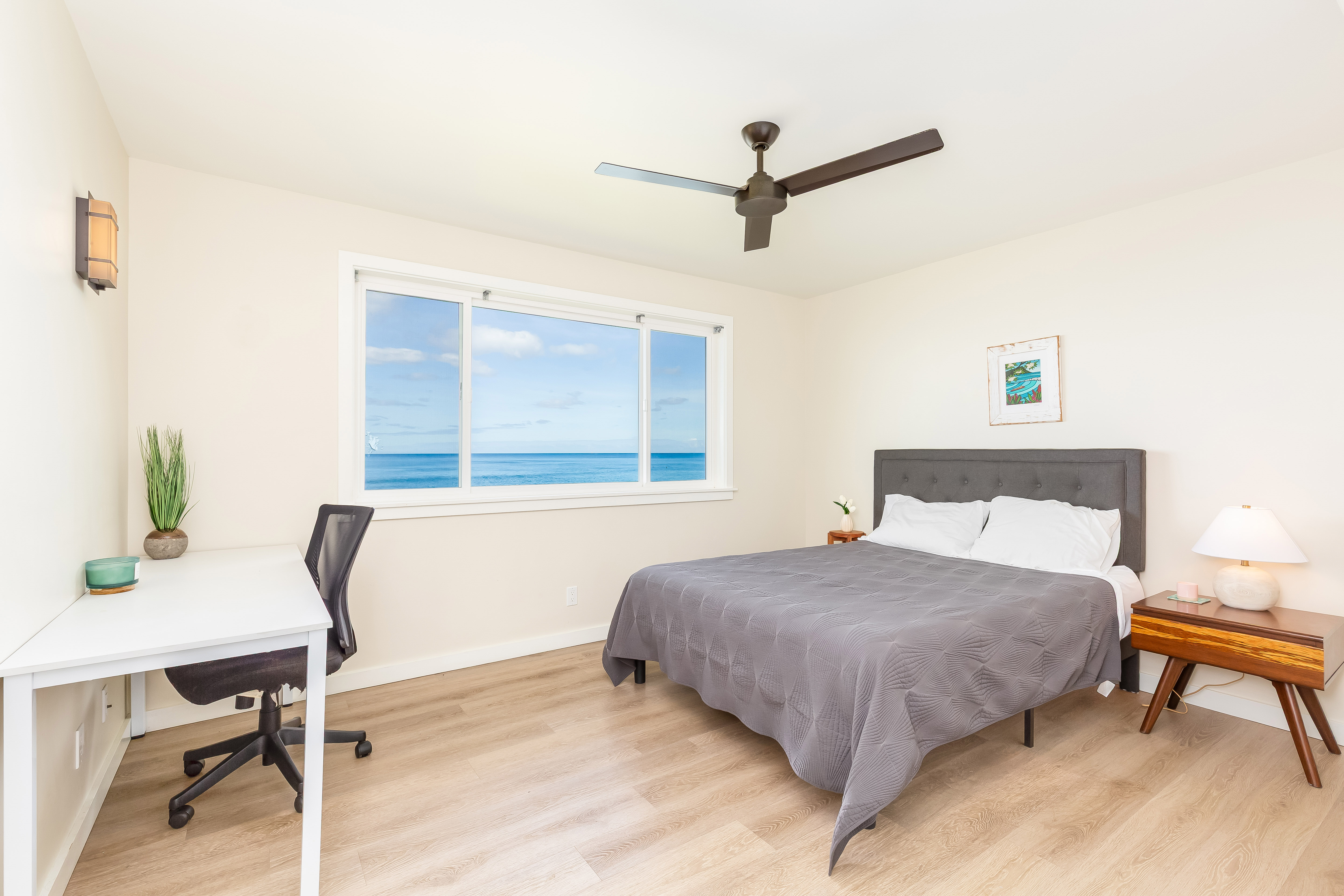 87-849 Farrington Highway, Unit C Waianae, HI 96792 - Photo 11 of 26 a bedroom with a bed and a desk