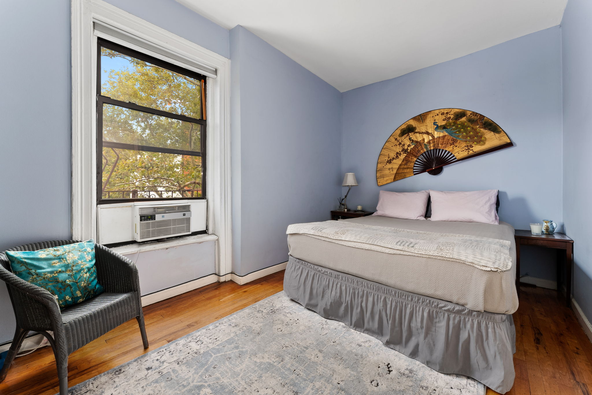 311 Henry Street, Unit 3 Brooklyn, NY 11201 - Photo 5 of 10 a bedroom with a bed and a window