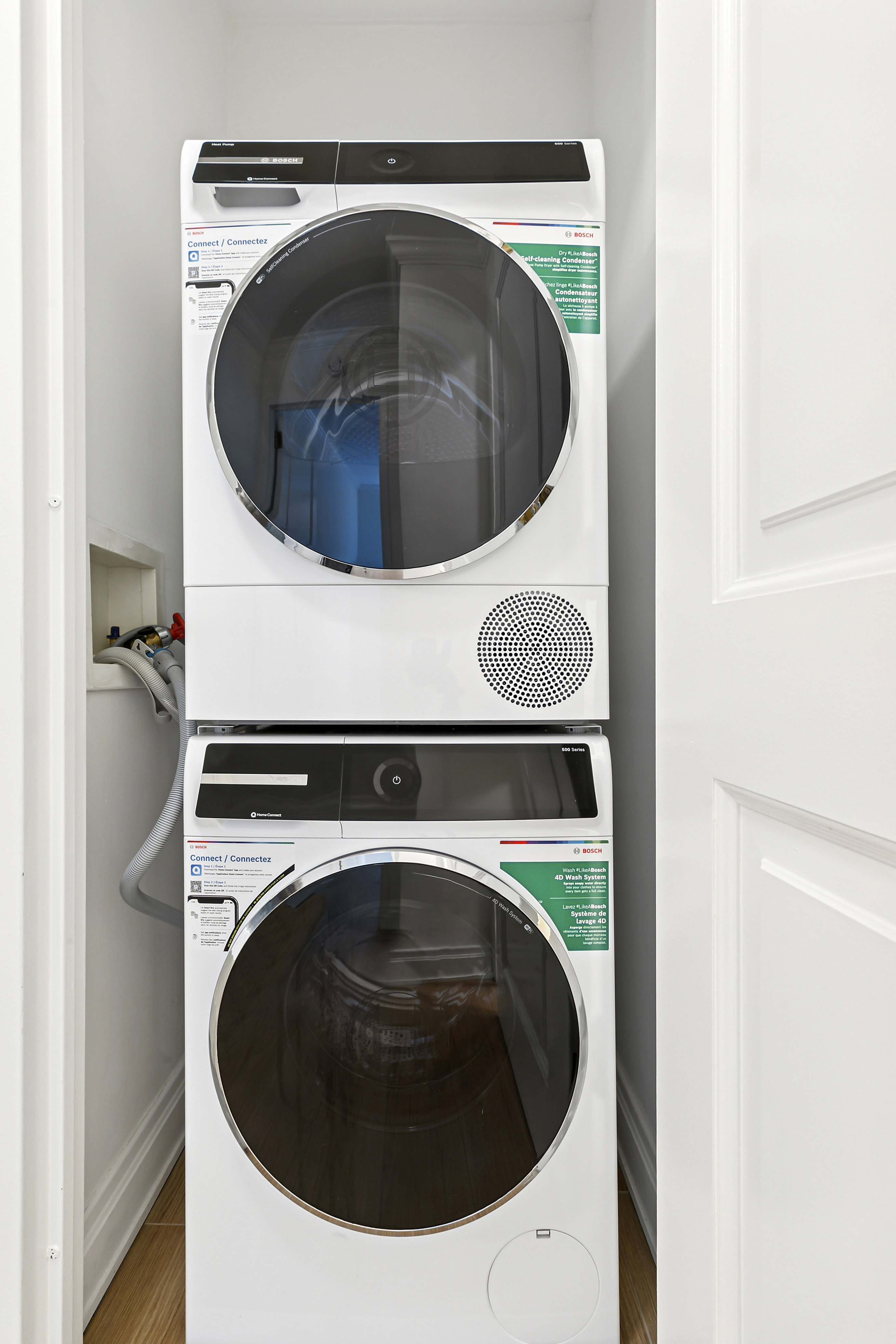 350 East 82nd Street, Unit 4C Manhattan, NY 10028 - Photo 7 of 13 a utility room with dryer and washer