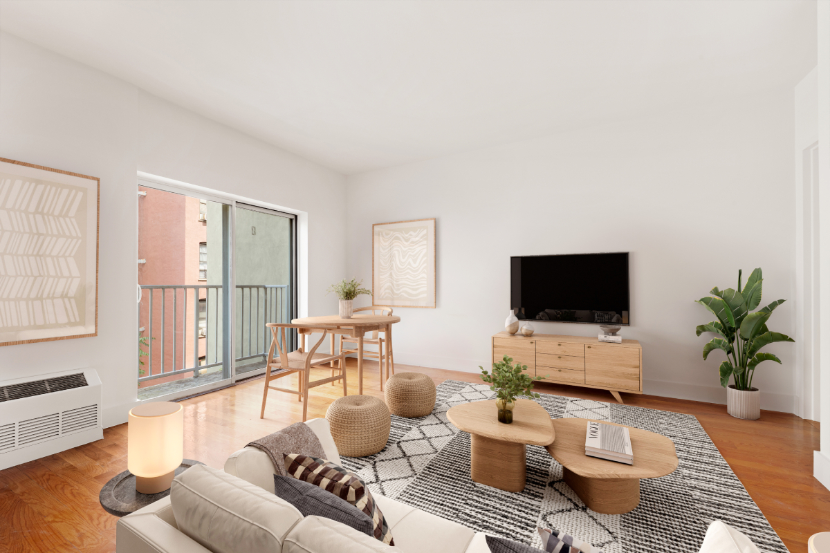 221 West 148th Street, Unit 4B Manhattan, NY 10039 - Photo 2 of 10 a living room with furniture and a flat screen tv