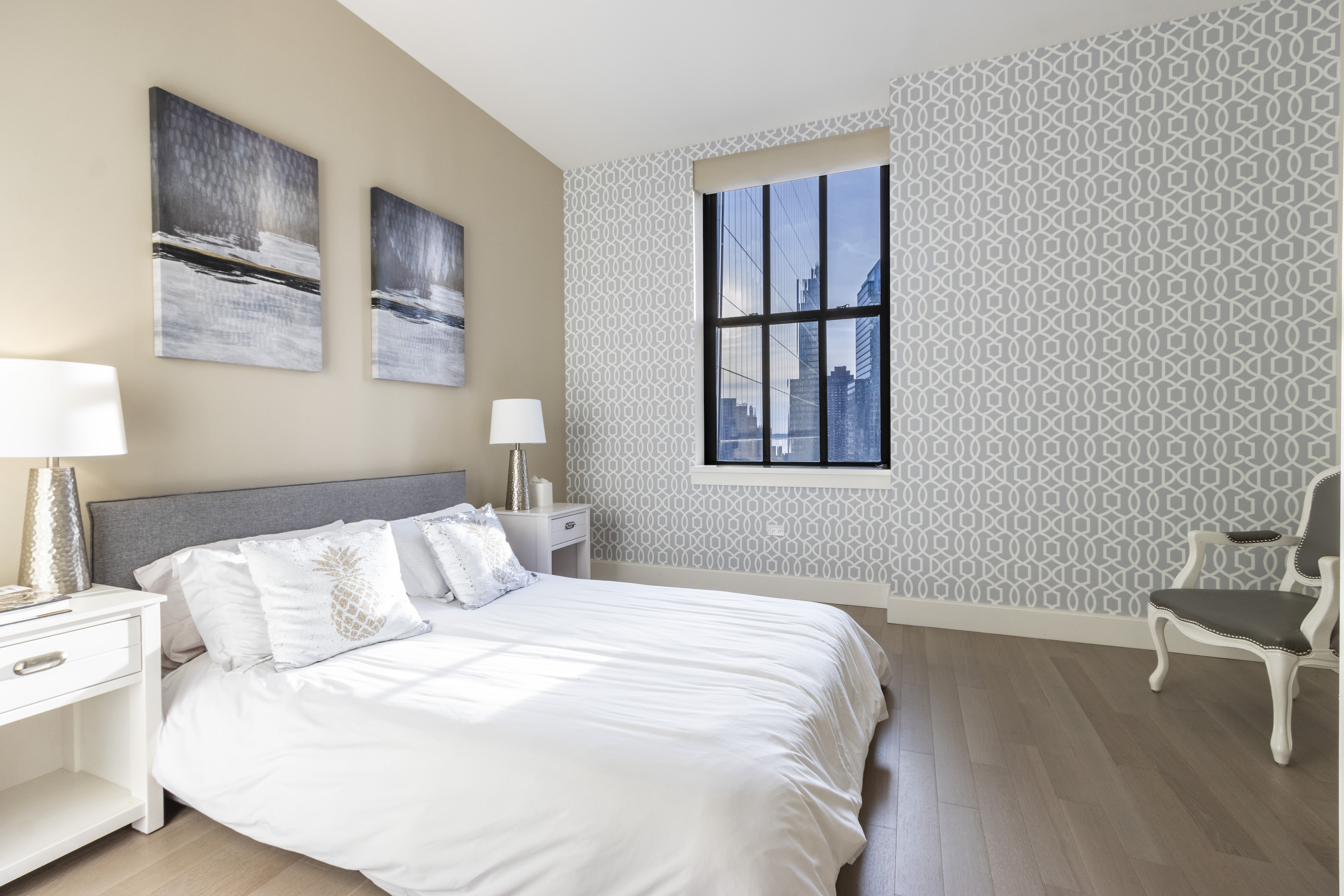 100 Barclay Street, Unit 15P Manhattan, NY 10007 - Photo 20 of 34 a bedroom with a bed and a window