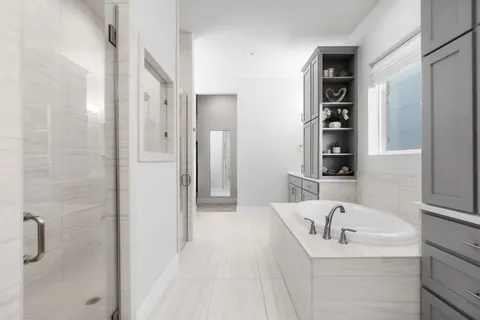 a bathroom with a sink and a bathtub