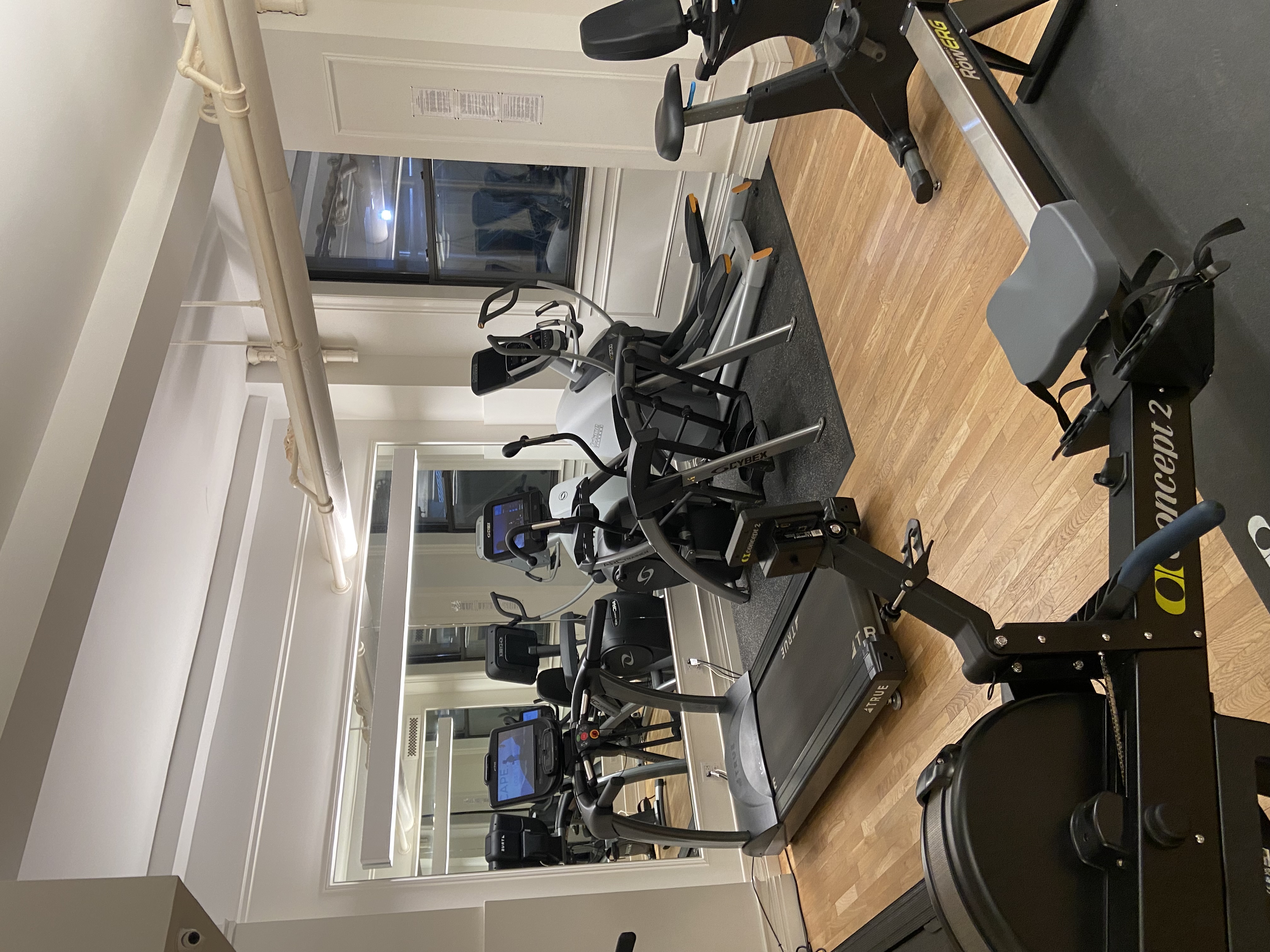 395 Riverside Drive, Unit 5F Manhattan, NY 10025 - Photo 7 of 8 a room with gym equipment