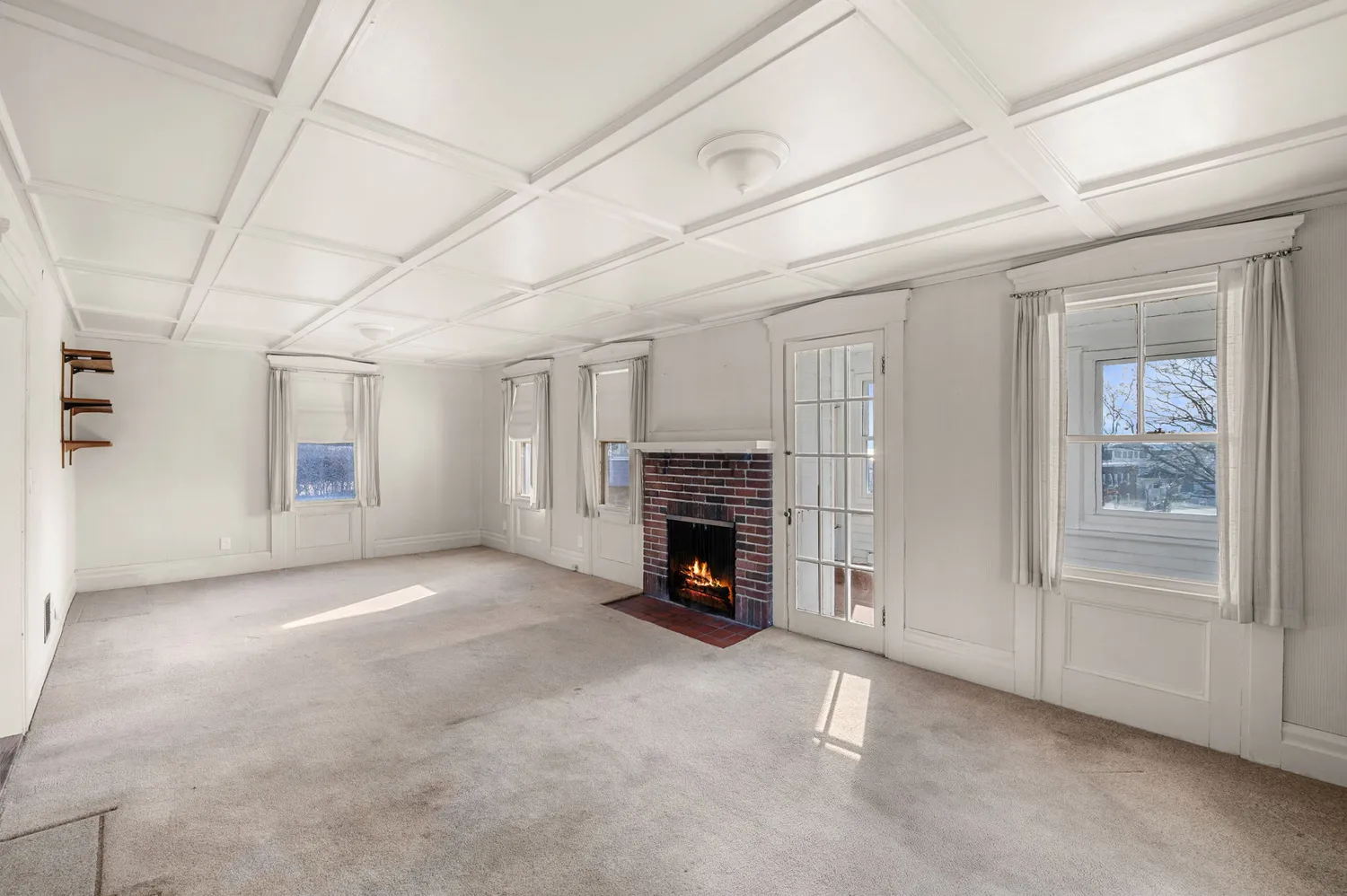 a view of a livingroom with a fireplace