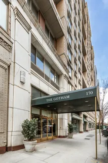 a view of a patio with couches table and chairs