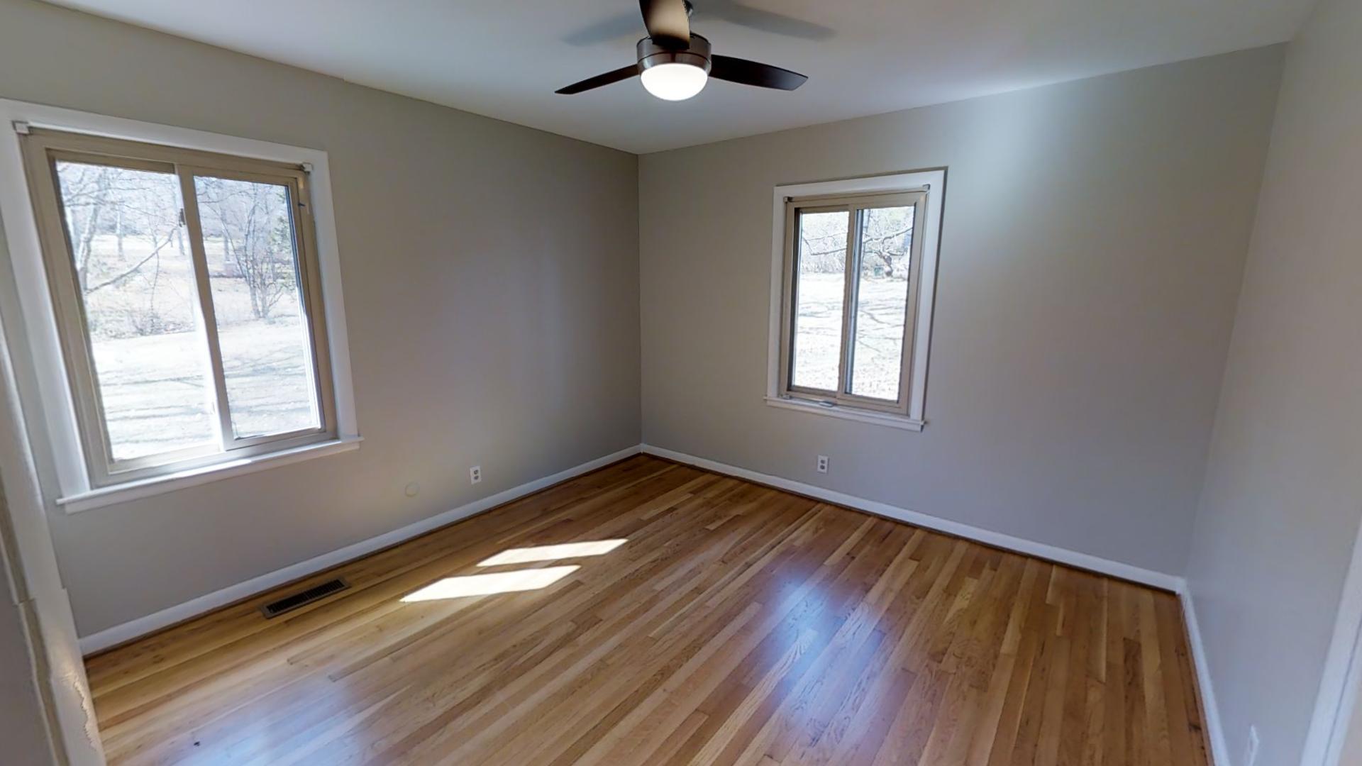 4425 Prescott Road Nashville, TN 37204 - Photo 18 of 26 a view of empty room with wooden floor and fan