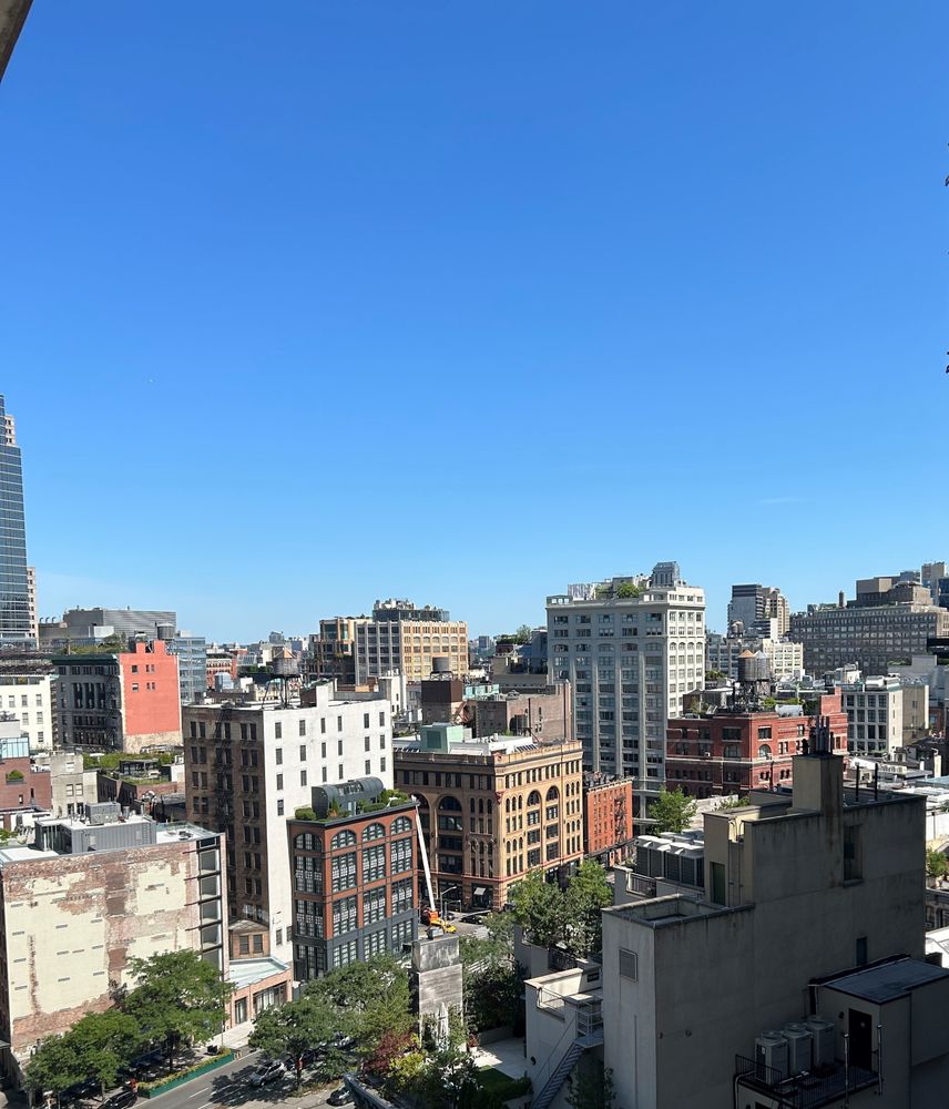 a view of a balcony with furniture