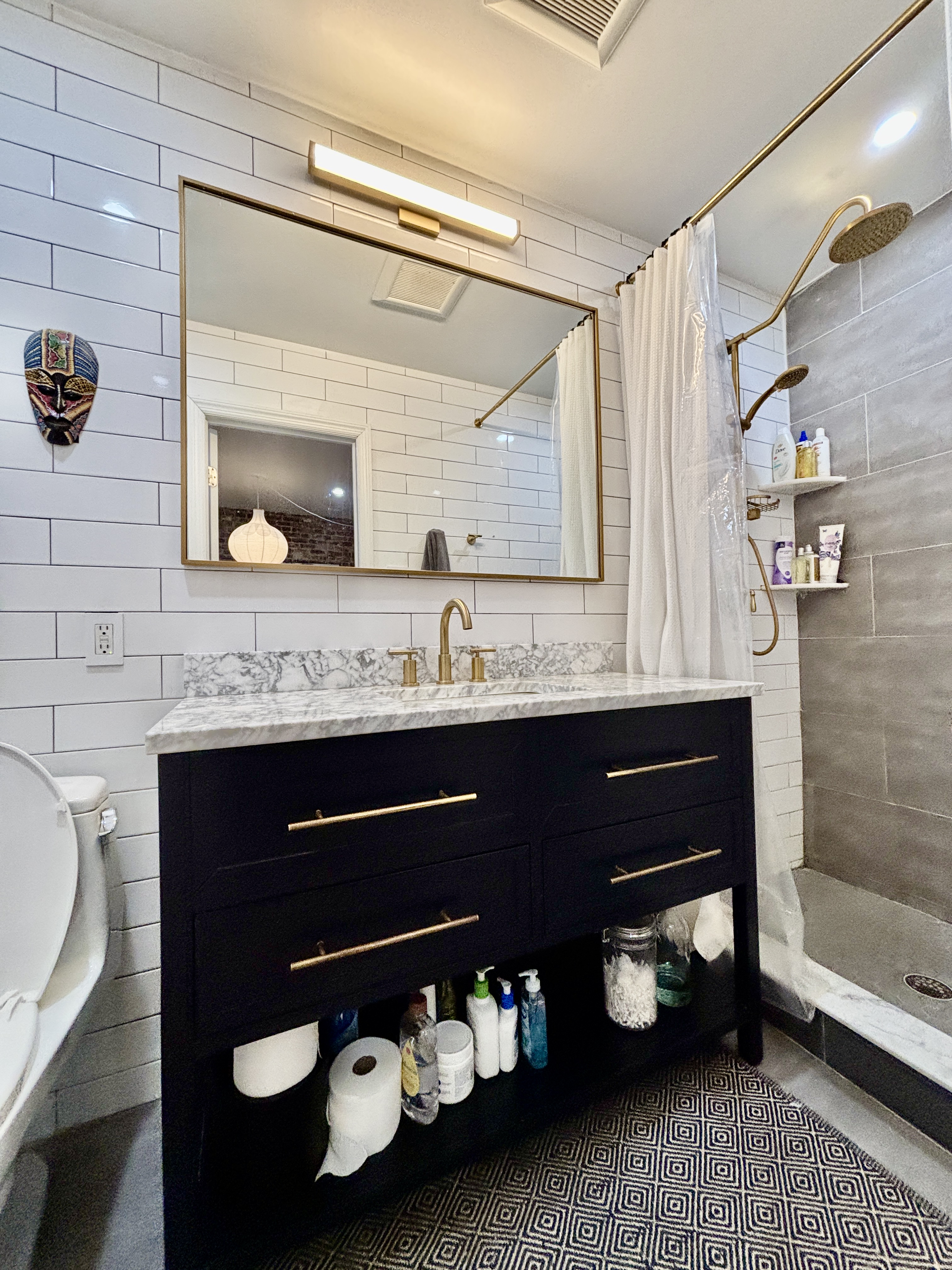 848 Macon Street, Unit PARLOR Brooklyn, NY 11233 - Photo 7 of 10 a bathroom with a sink a vanity and a mirror