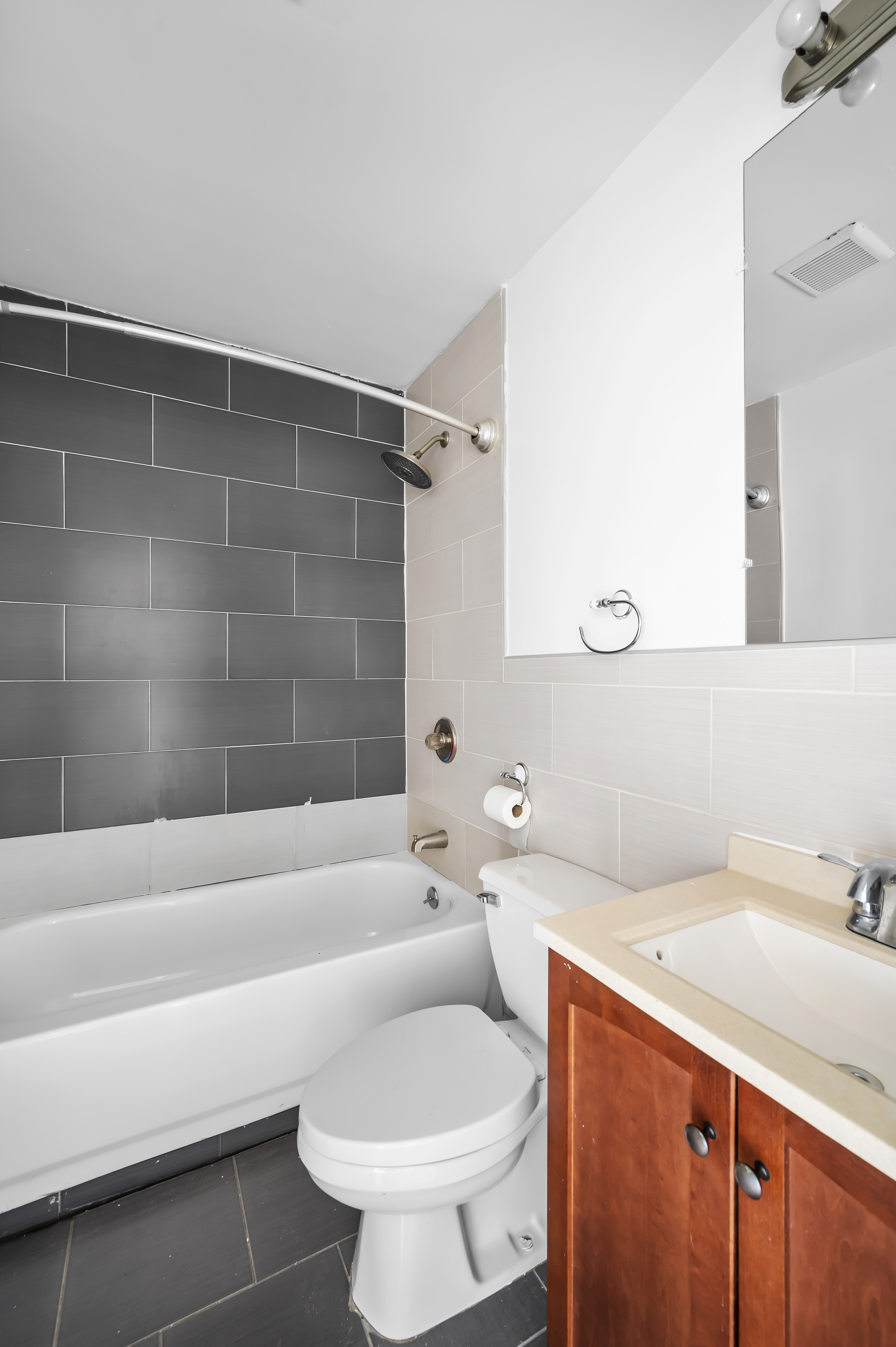 930 Jefferson Avenue, Unit 2 Brooklyn, NY 11221 - Photo 9 of 12 a bathroom with a toilet sink and bathtub