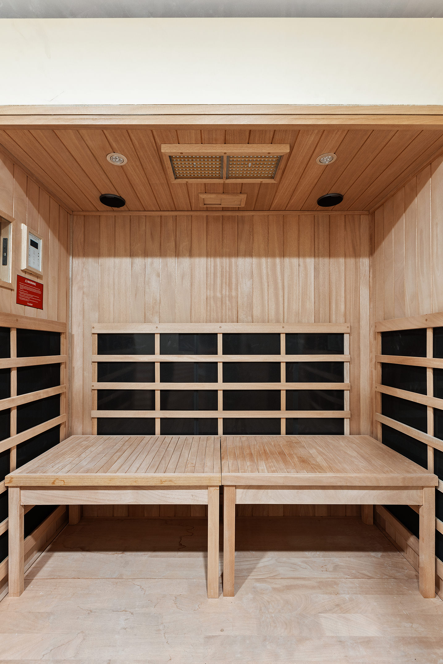 194 East 2nd Street, Unit 4A Manhattan, NY 10009 - Photo 9 of 13 a view of staircase with wooden floor and book shelf