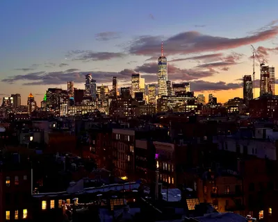 a view of a dining room with furniture and window
