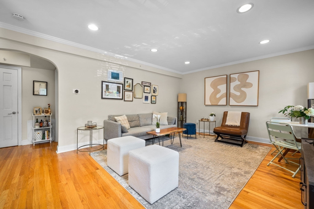 27-29 Commonwealth Avenue, Unit 9 Newton, MA 02467 - Photo 2 of 20 a living room with furniture and a couch