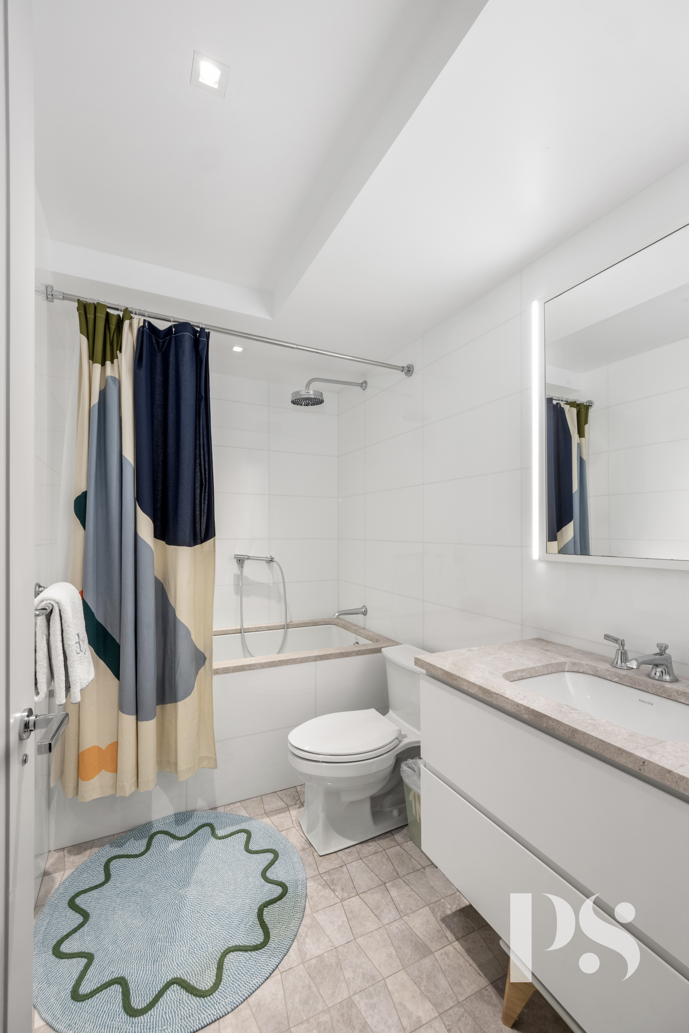 733 Park Avenue, Unit 4 Manhattan, NY 10021 - Photo 25 of 29 a bathroom with a sink toilet and shower