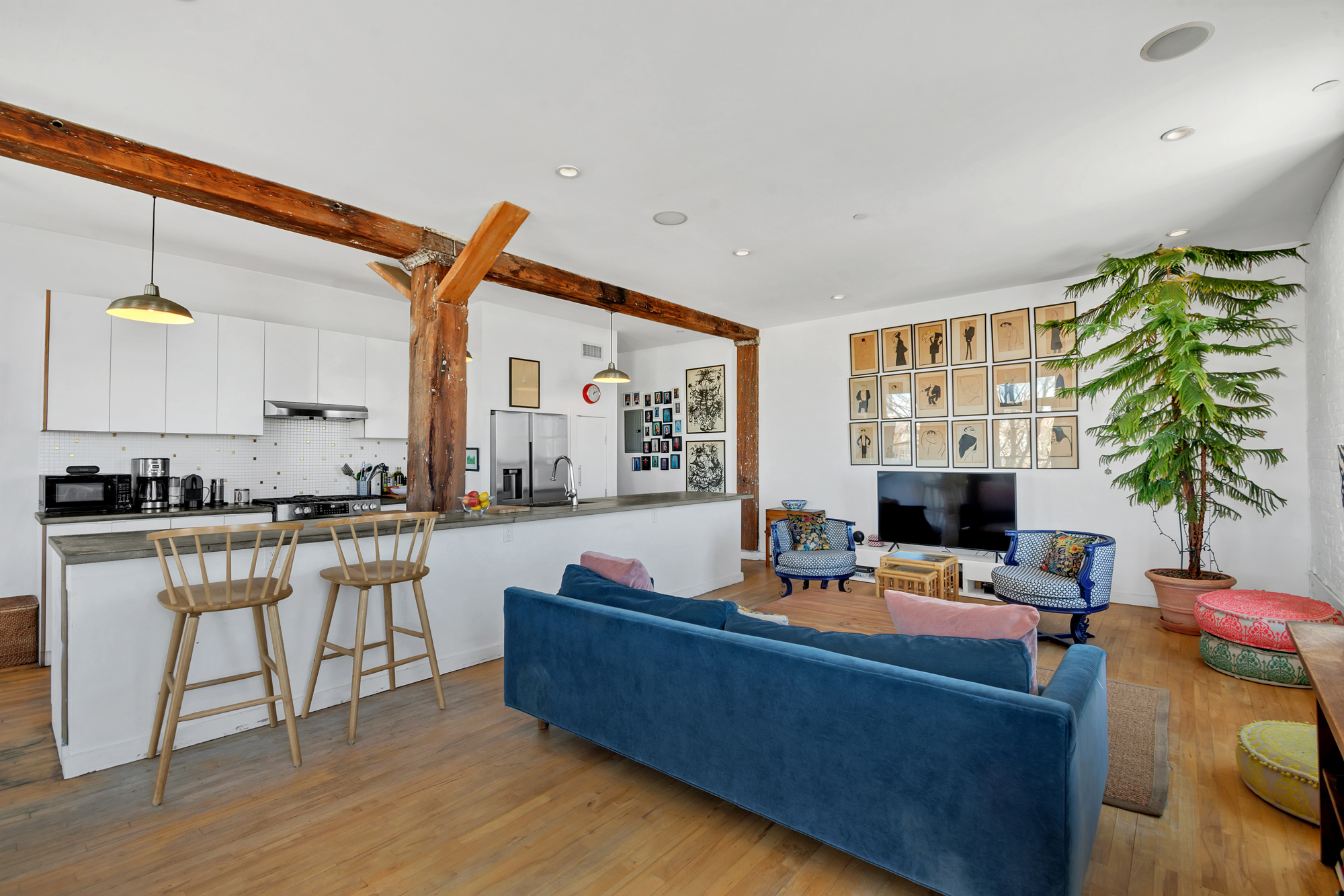 25 Carroll Street, Unit 4C Brooklyn, NY 11231 - Photo 4 of 27 a living room with furniture and a wooden floor