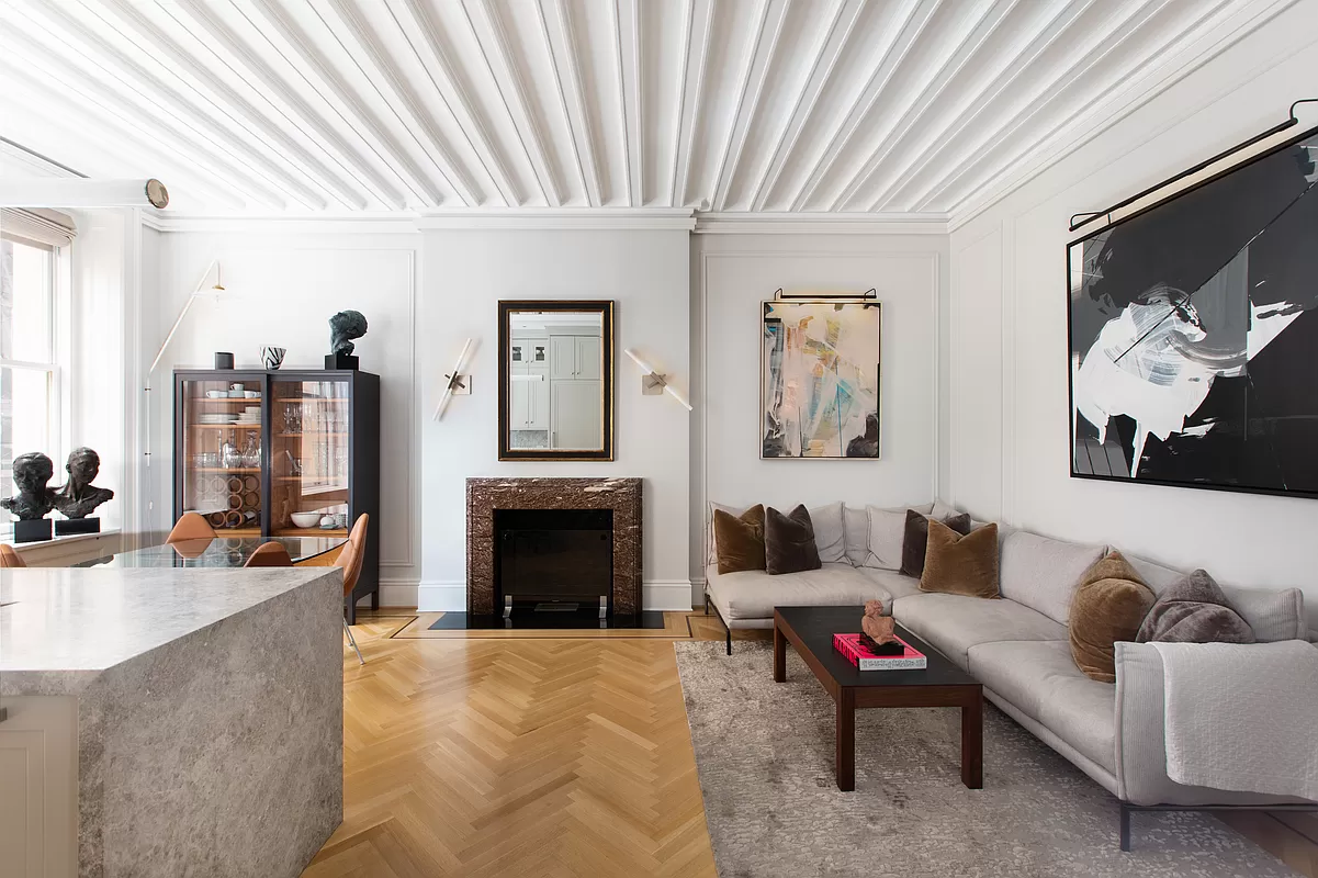 390 West End Avenue, Unit 7DS Manhattan, NY 10024 - Photo 6 of 31 a living room with furniture a fireplace and a flat screen tv