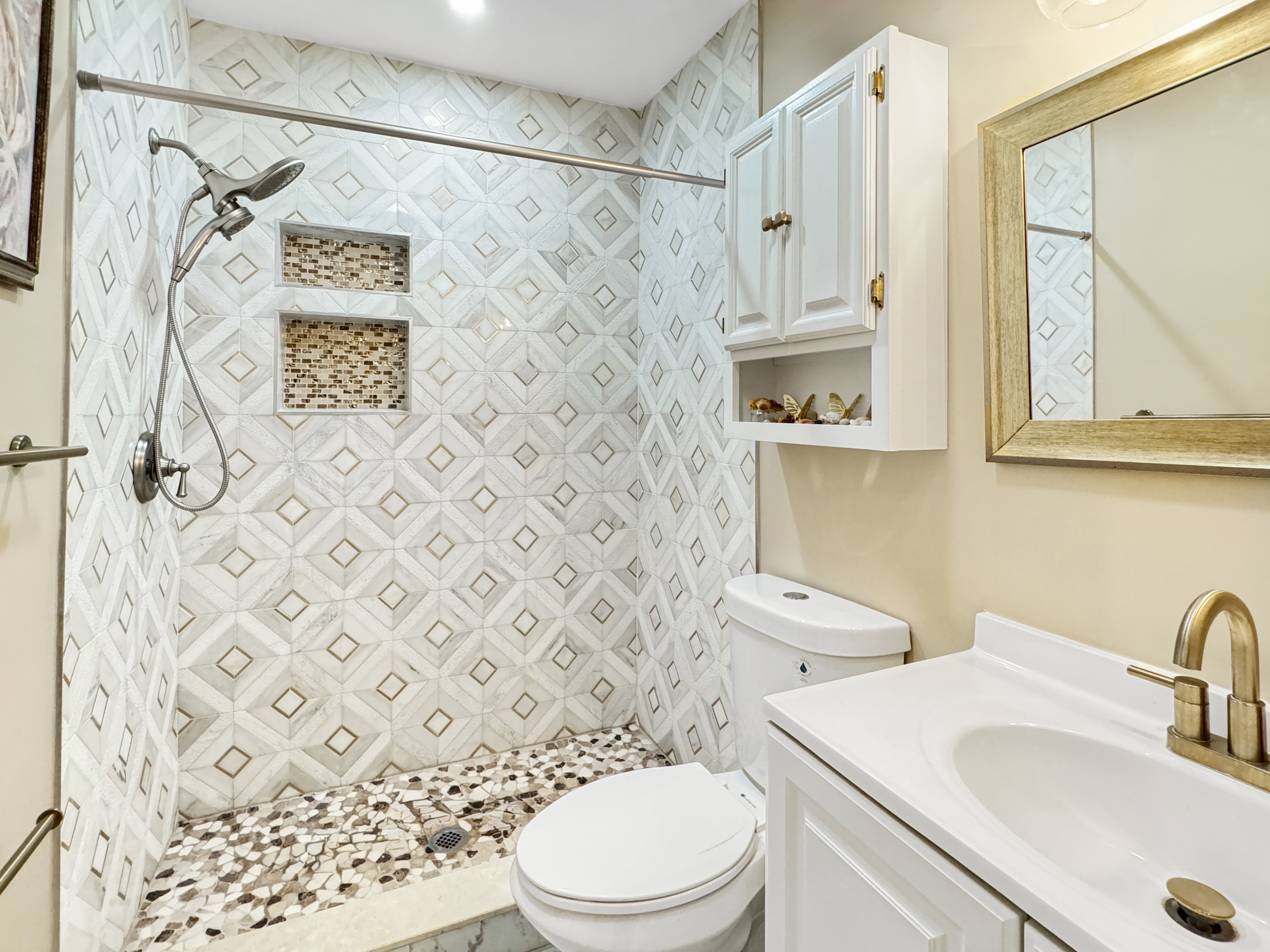 2408 Lillian Drive Silver Spring, MD 20902 - Photo 12 of 40 a bathroom with a sink a toilet and shower curtain