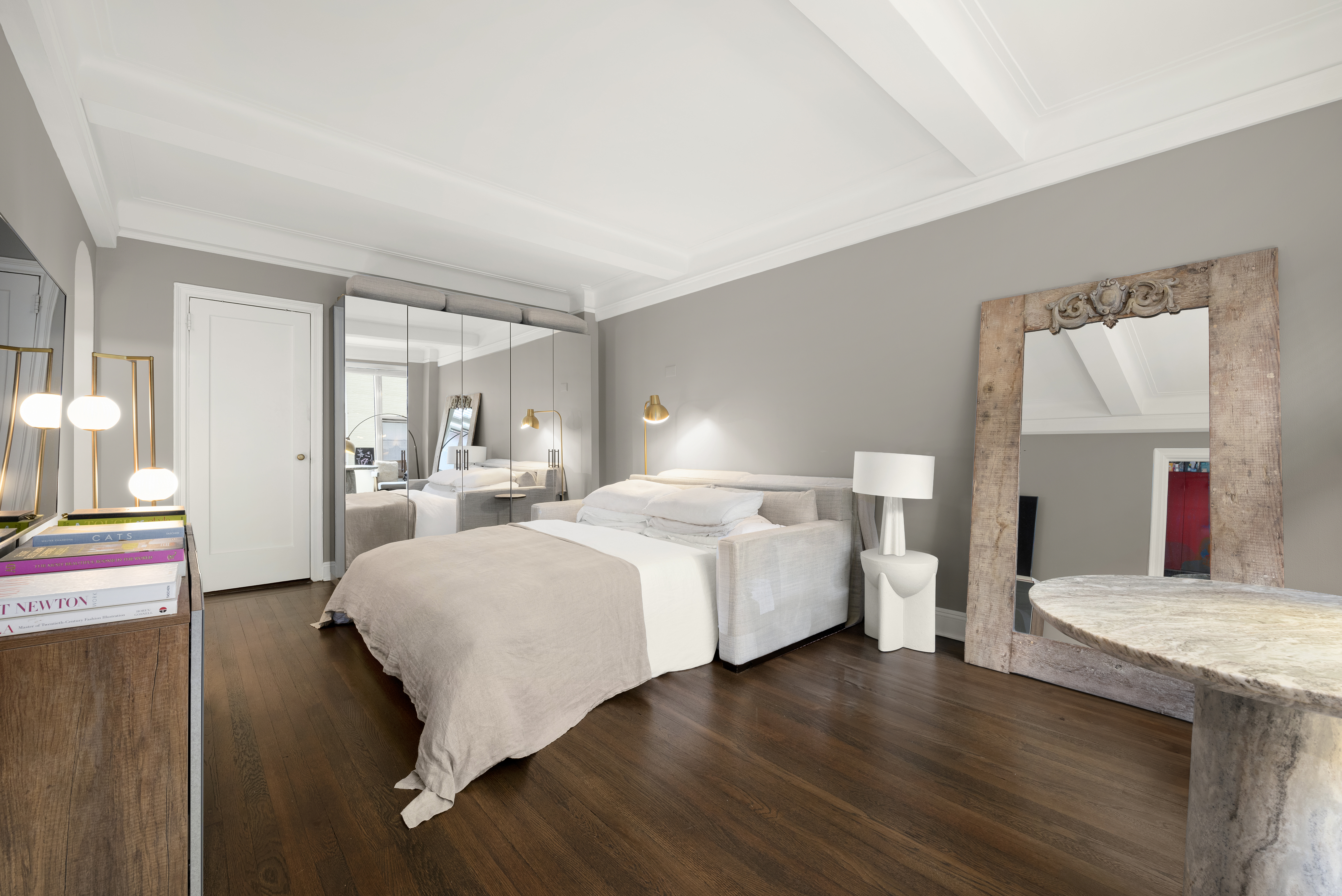 7 Park Avenue, Unit 2H Manhattan, NY 10016 - Photo 1 of 11 a bedroom with a bed and wooden floor