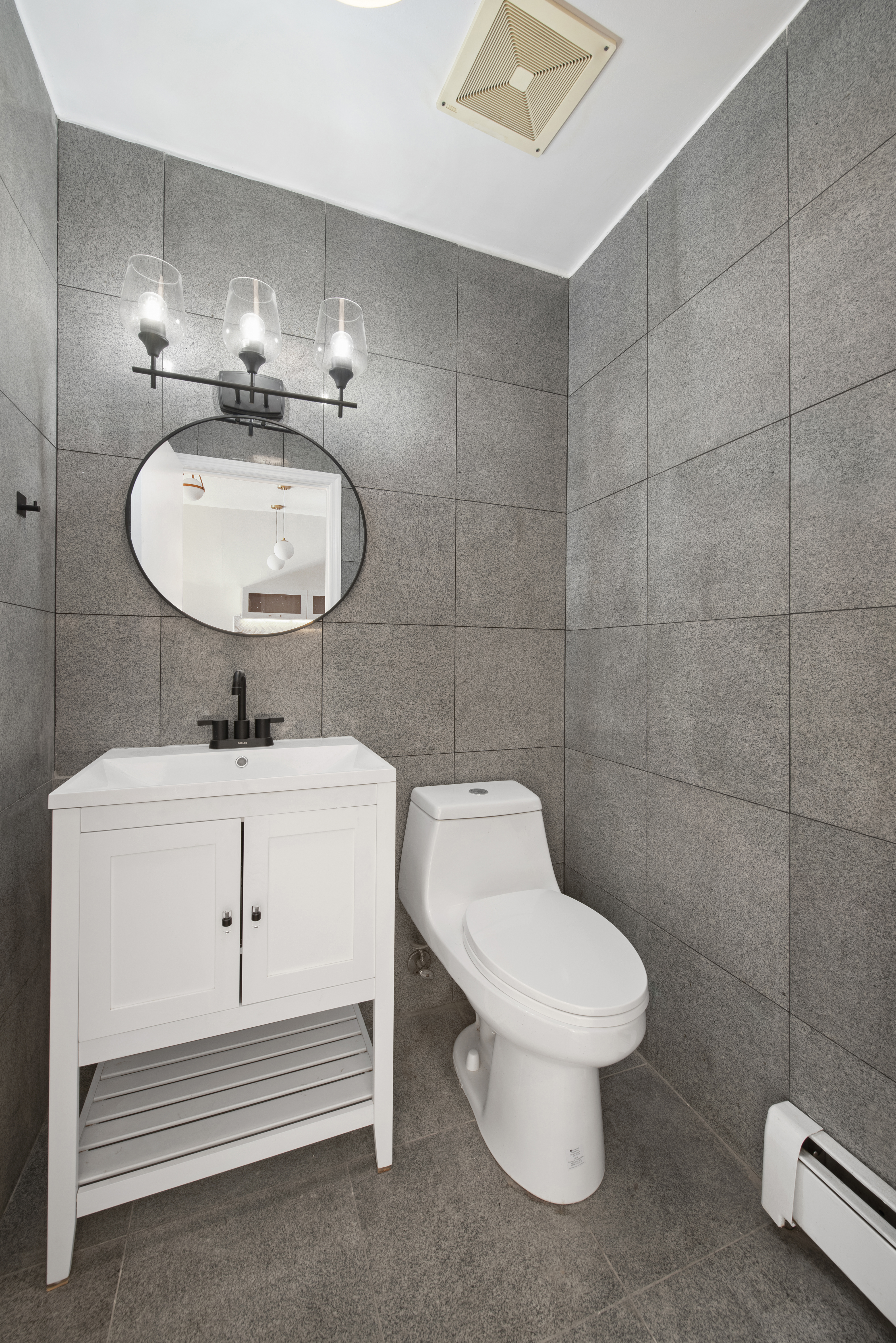 336 Convent Avenue, Unit MLTFMLY Manhattan, NY 10031 - Photo 8 of 20 a bathroom with a toilet and a sink