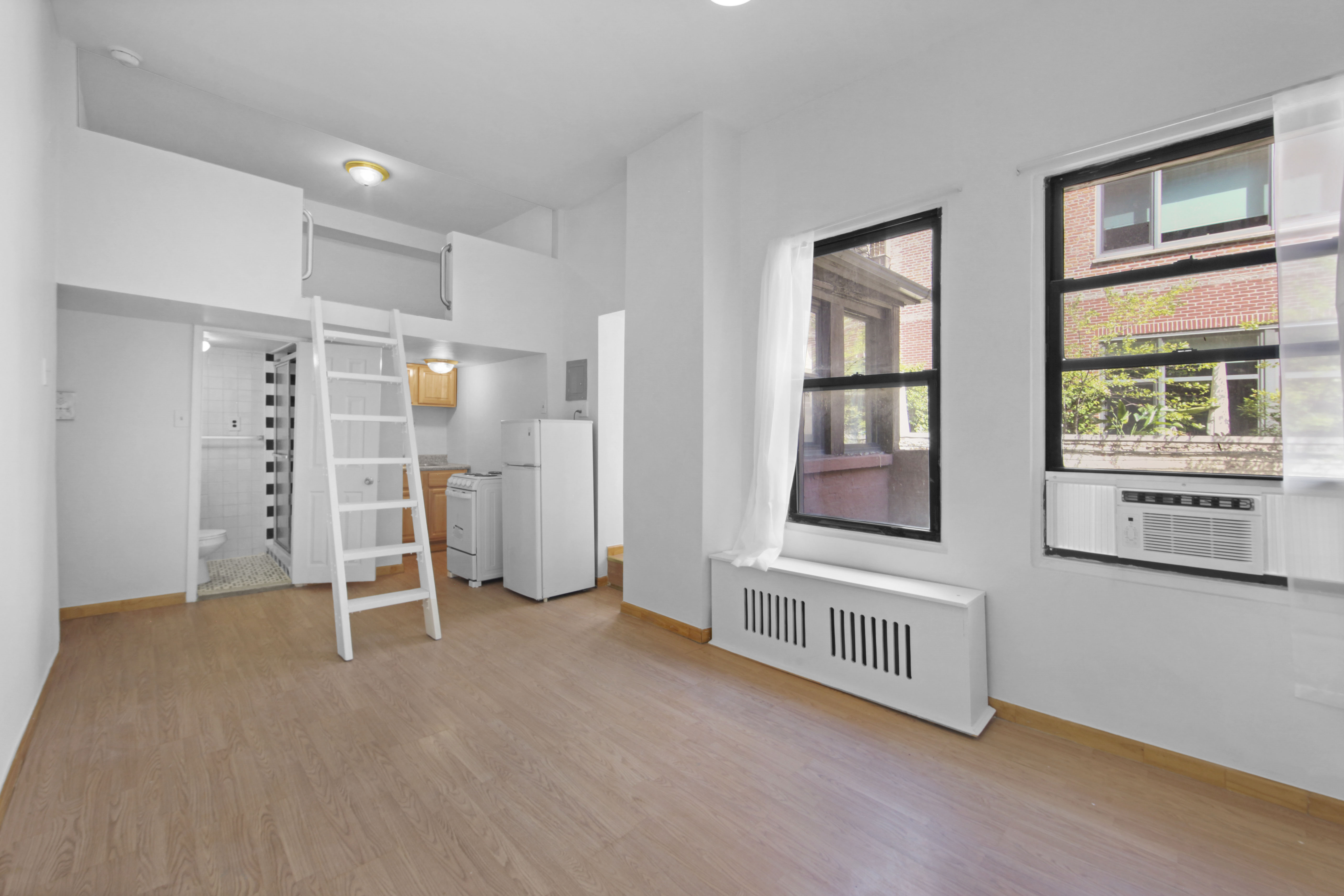 155 Hicks Street, Unit 2B Brooklyn, NY 11201 - Photo 8 of 11 a view of an empty room with a window