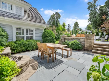 a view of a chairs and table in the patio