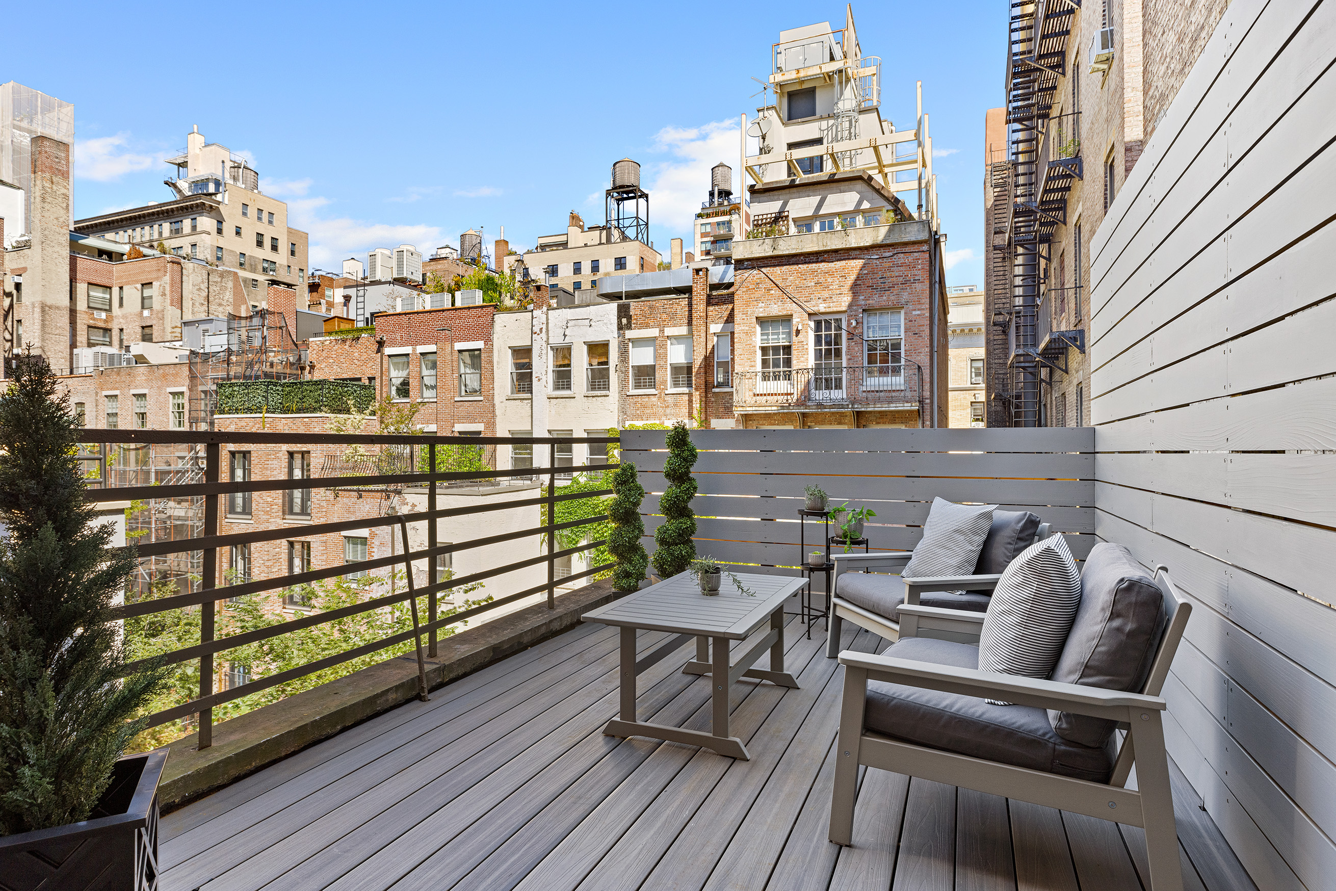 25 East 94th Street Manhattan, NY 10128 - Photo 30 of 33 a view of a balcony with outdoor seating