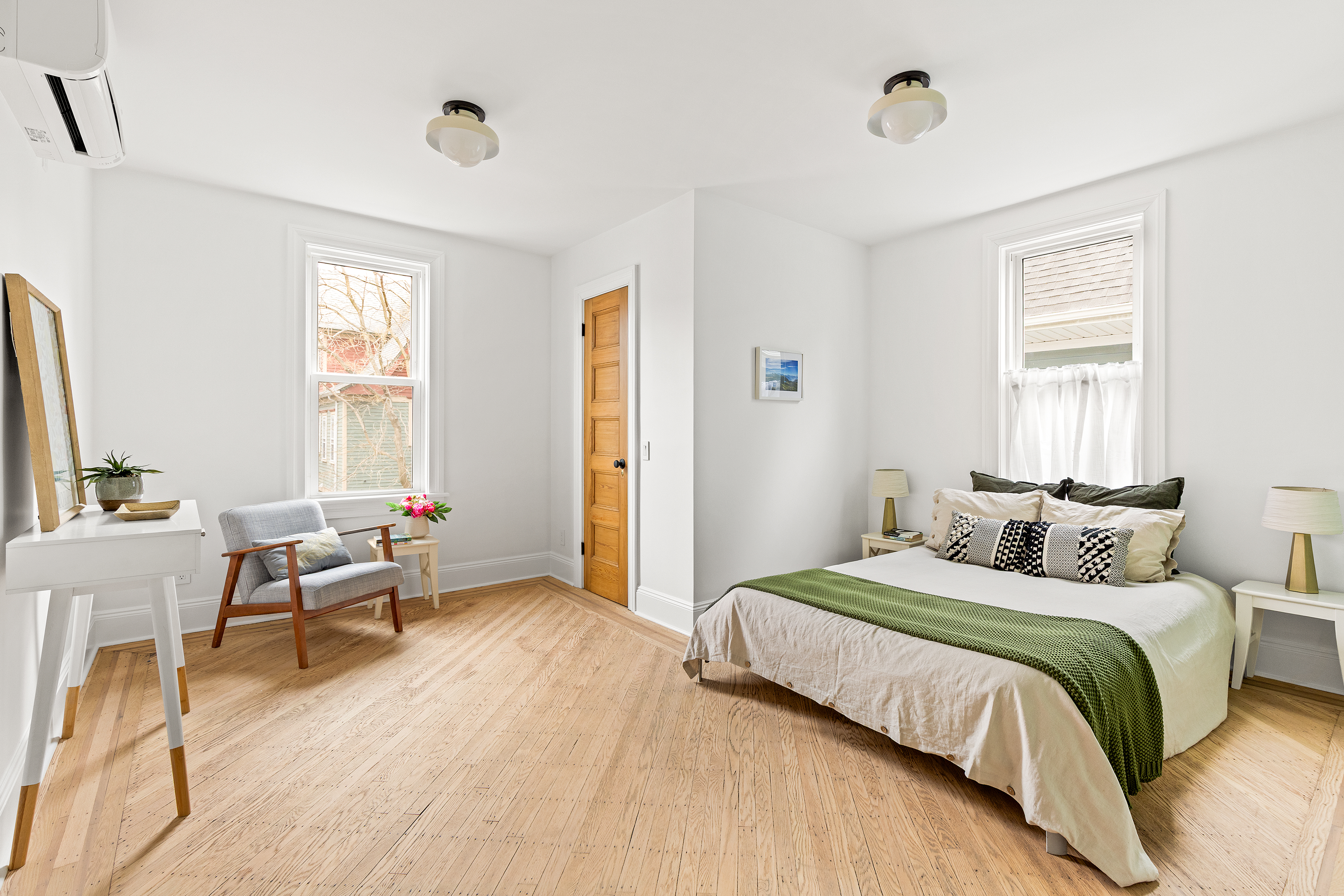 467 Rugby Road Brooklyn, NY 11226 - Photo 11 of 22 a bedroom with a bed and a window