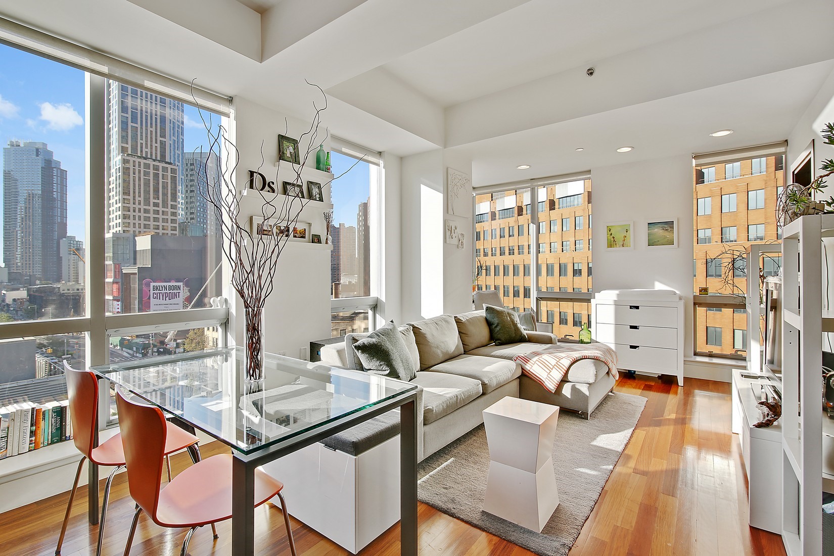 a living room with furniture and a table