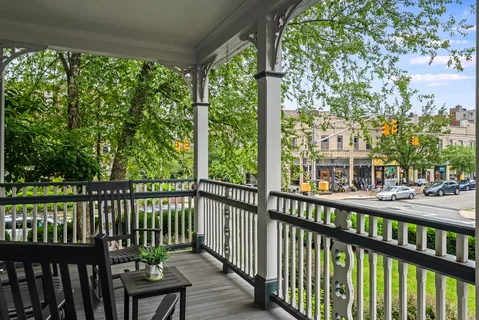 a view of a street from a balcony