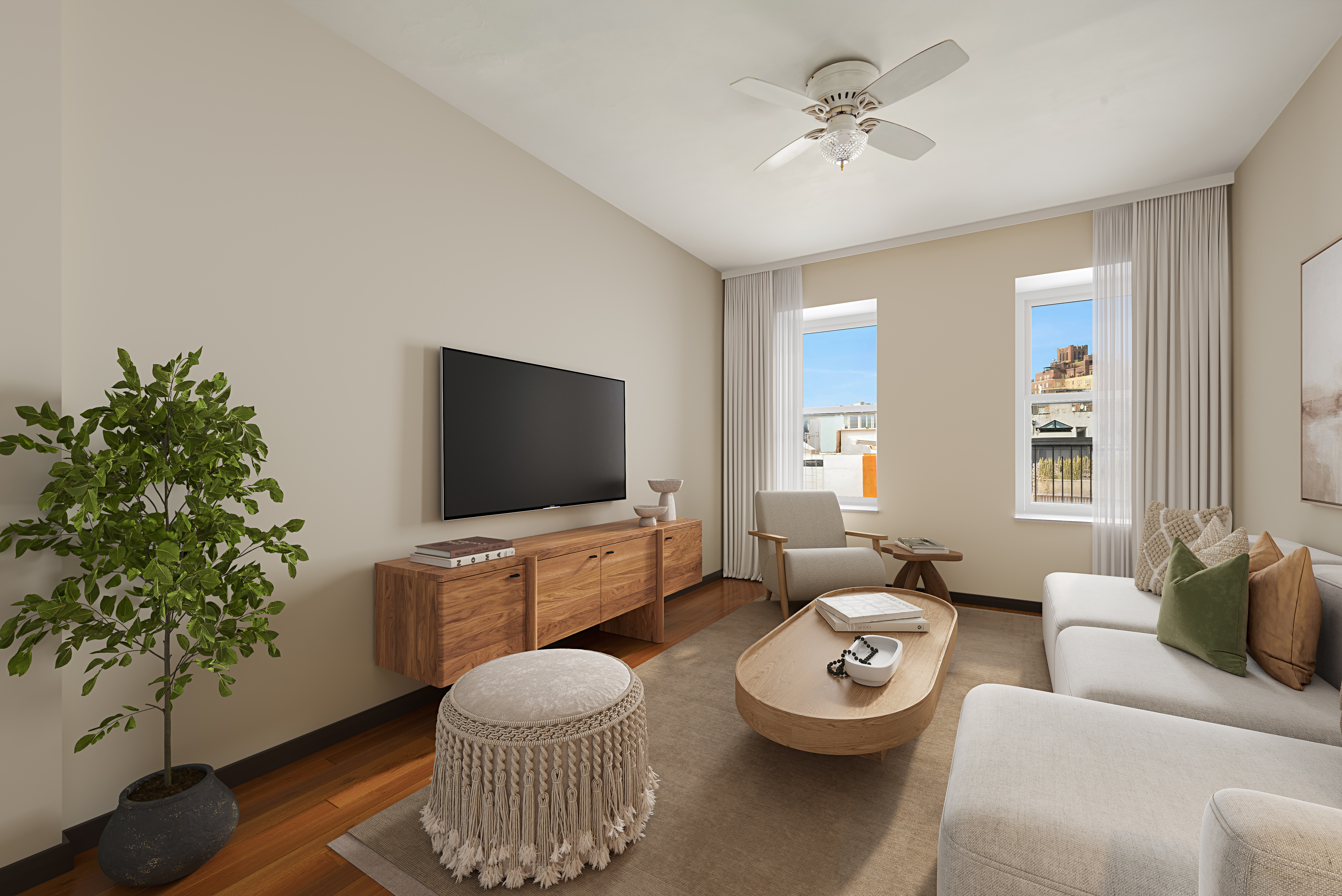 88 Charles Street, Unit 5D Manhattan, NY 10014 - Photo 1 of 11 a living room with furniture and a flat screen tv