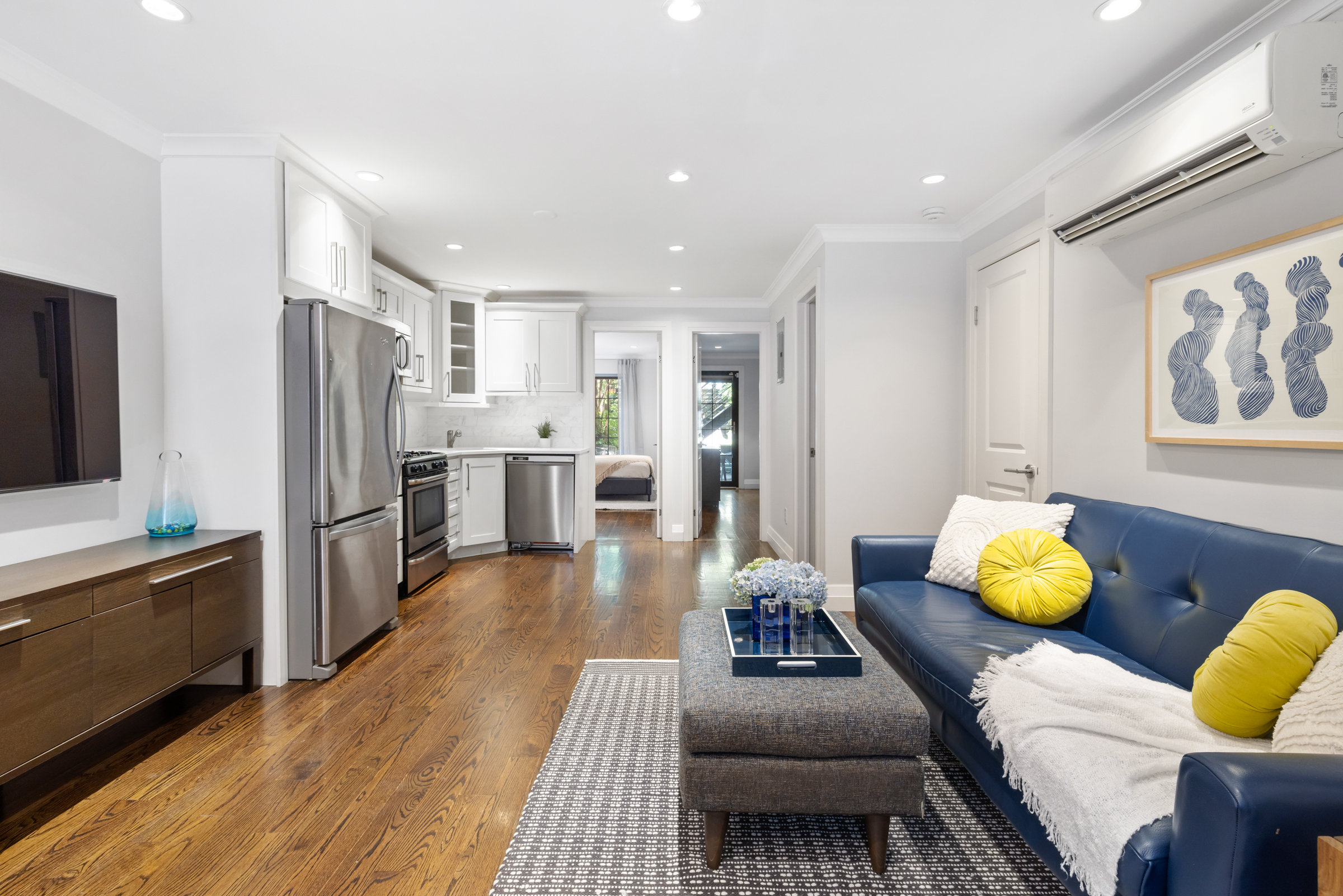 439 A Monroe Street Brooklyn, NY 11221 - Photo 17 of 29 a living room with stainless steel appliances furniture and a rug