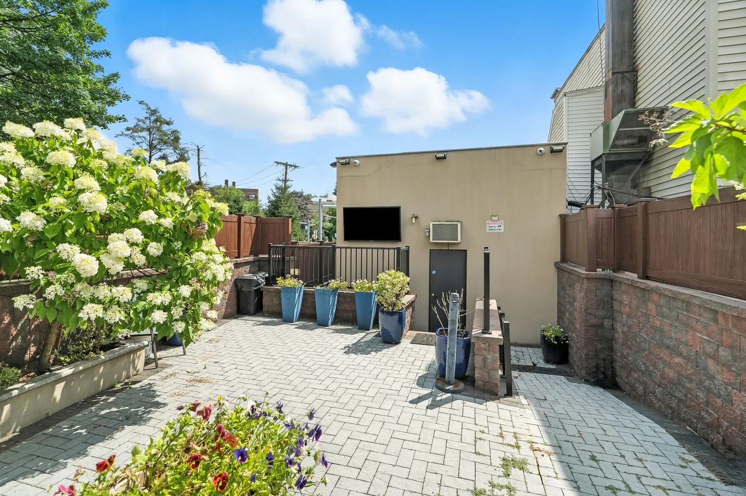 a view of a entryway with flower pots