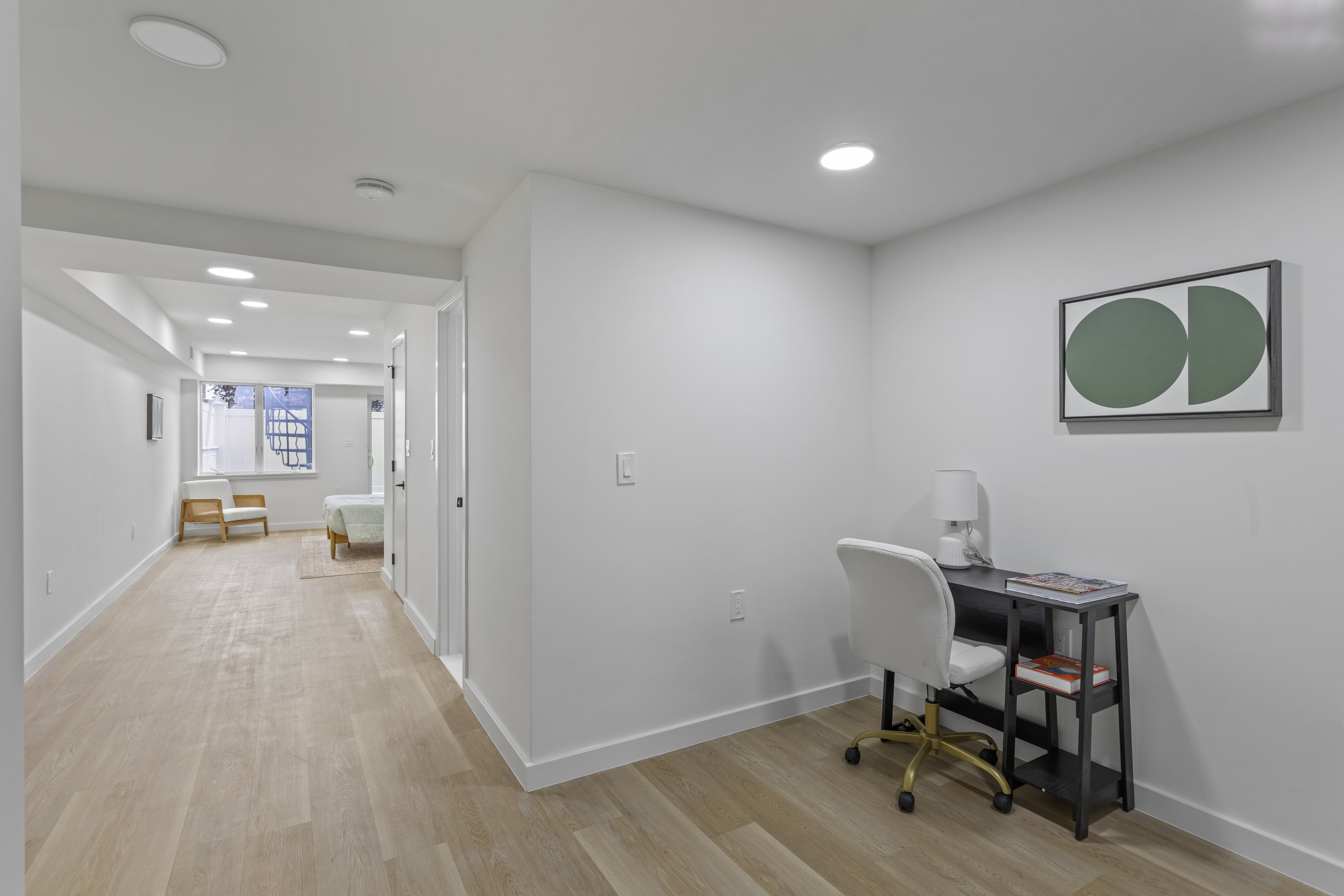 3112 Emmons Avenue, Unit 3140A-2 Brooklyn, NY 11235 - Photo 6 of 13 a view of a workspace with furniture and a window